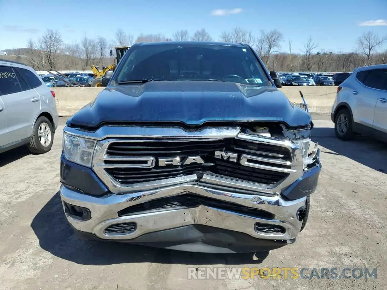 5 Photograph of a damaged car 1C6SRFFT1MN579180 RAM 1500 2021