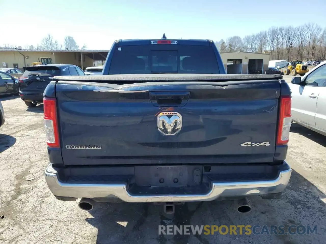 6 Photograph of a damaged car 1C6SRFFT1MN579180 RAM 1500 2021