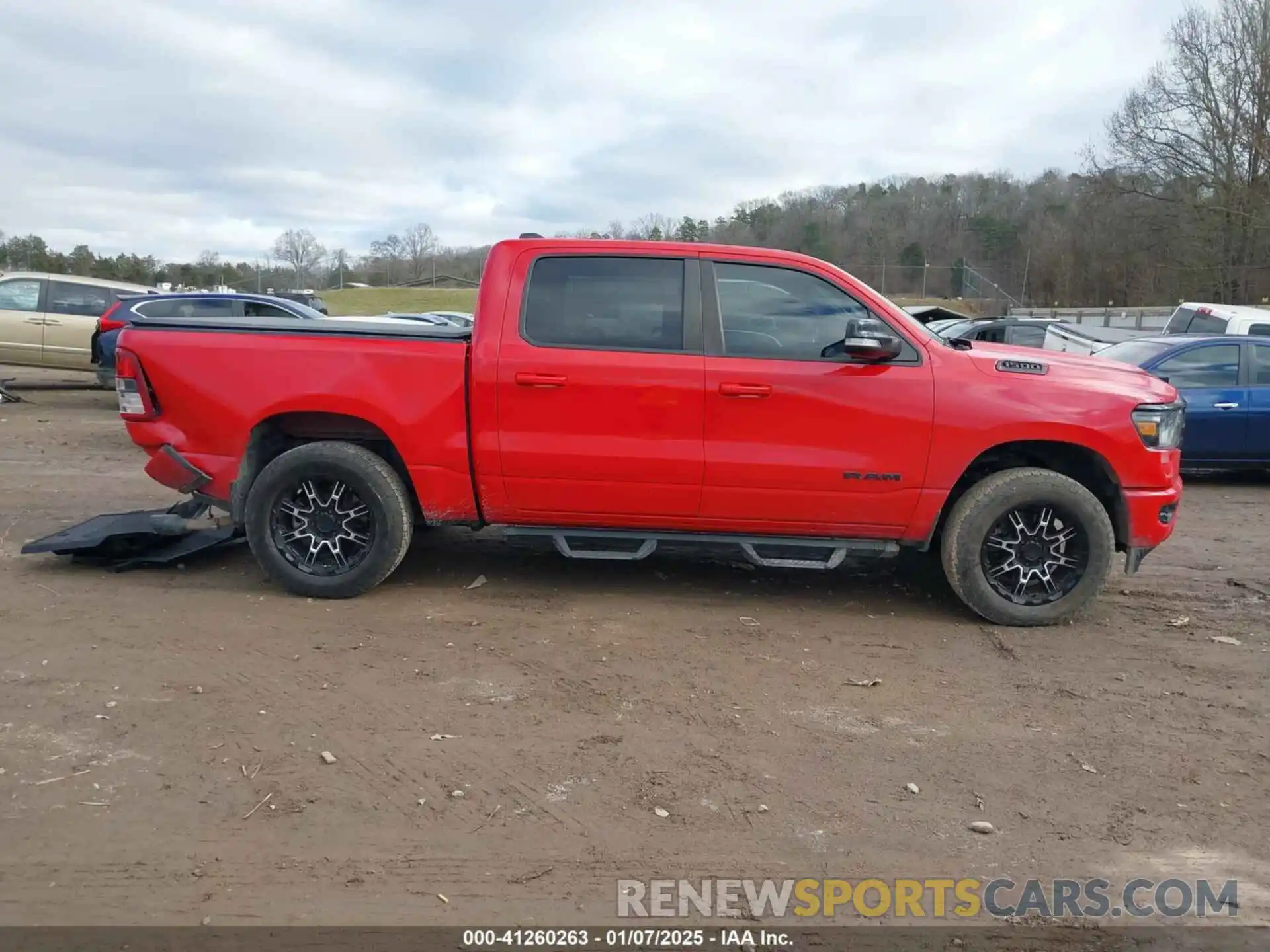 13 Photograph of a damaged car 1C6SRFFT1MN586470 RAM 1500 2021