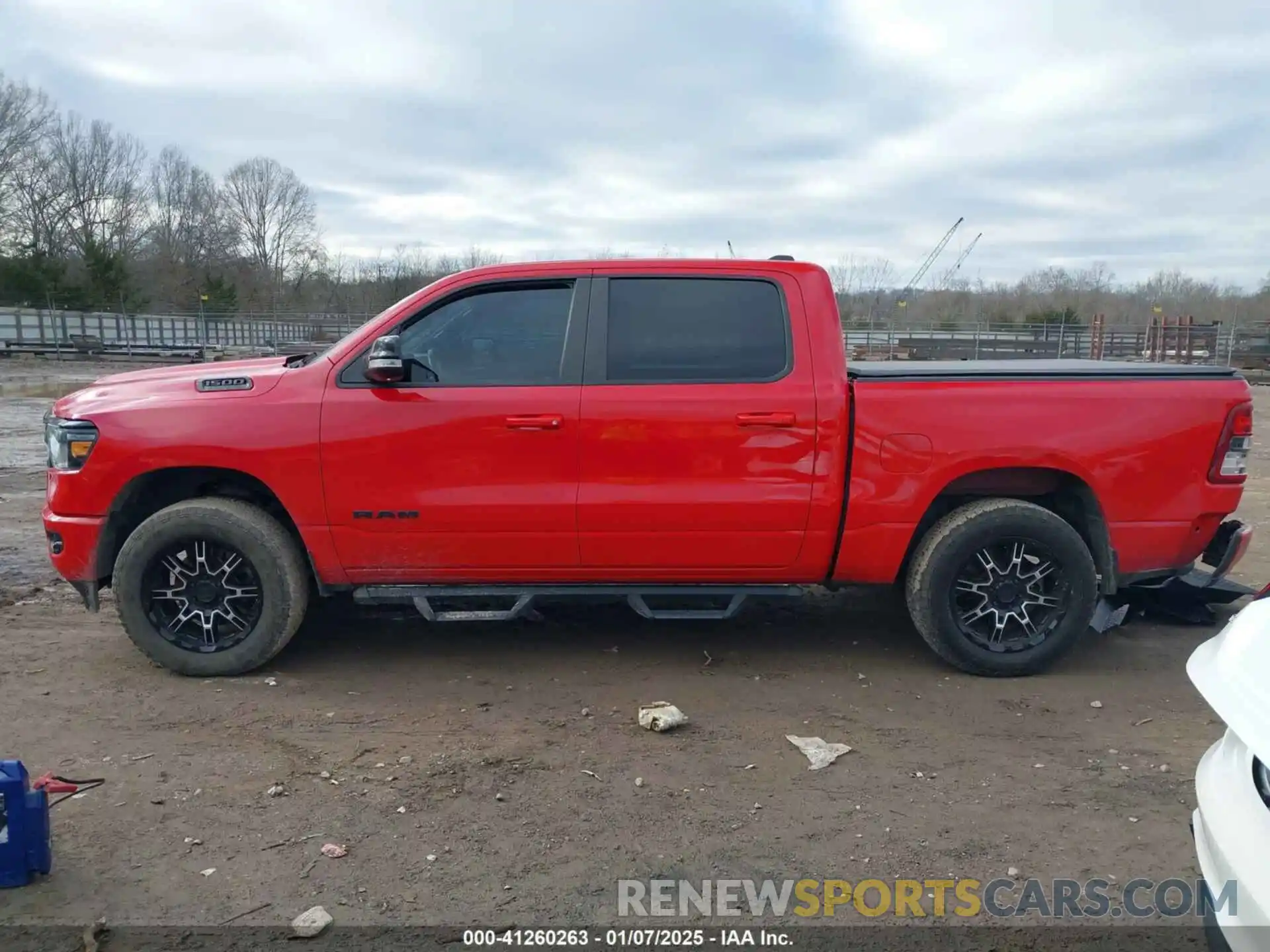 14 Photograph of a damaged car 1C6SRFFT1MN586470 RAM 1500 2021