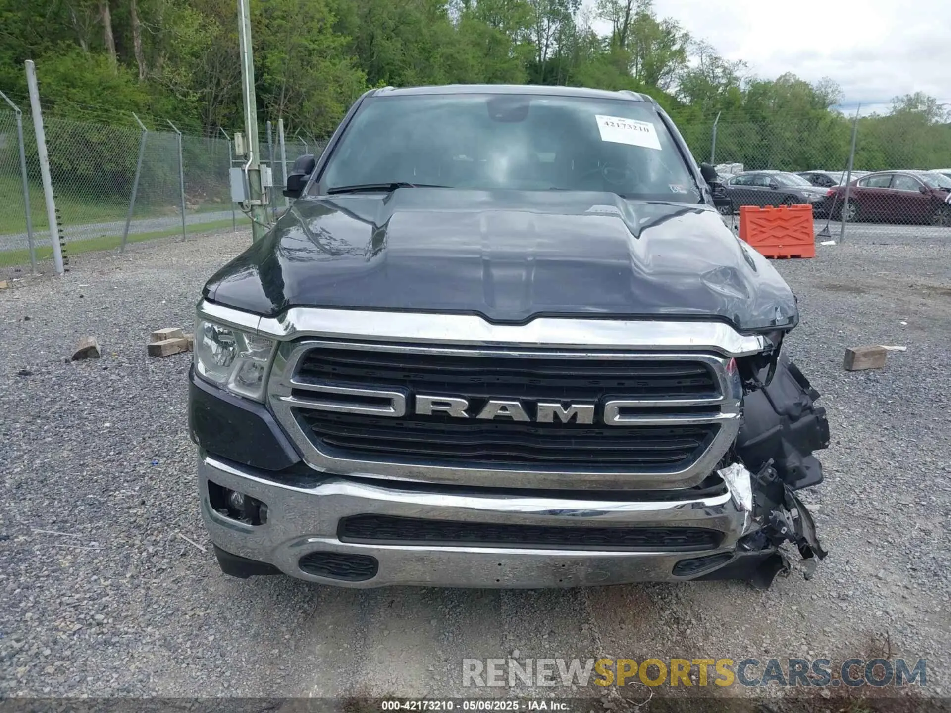 12 Photograph of a damaged car 1C6SRFFT1MN647851 RAM 1500 2021
