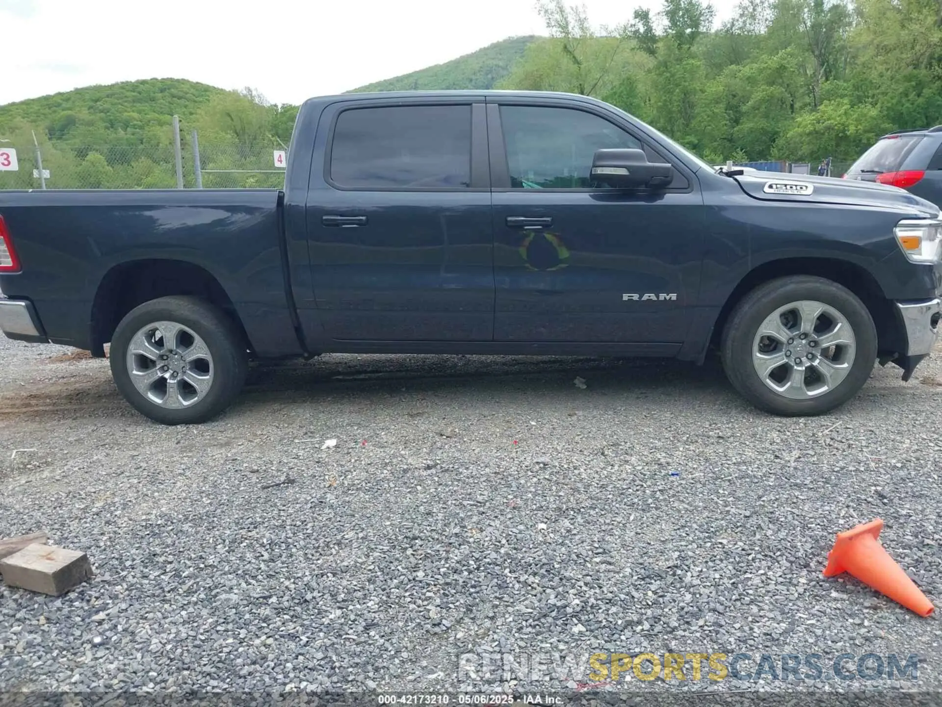 13 Photograph of a damaged car 1C6SRFFT1MN647851 RAM 1500 2021