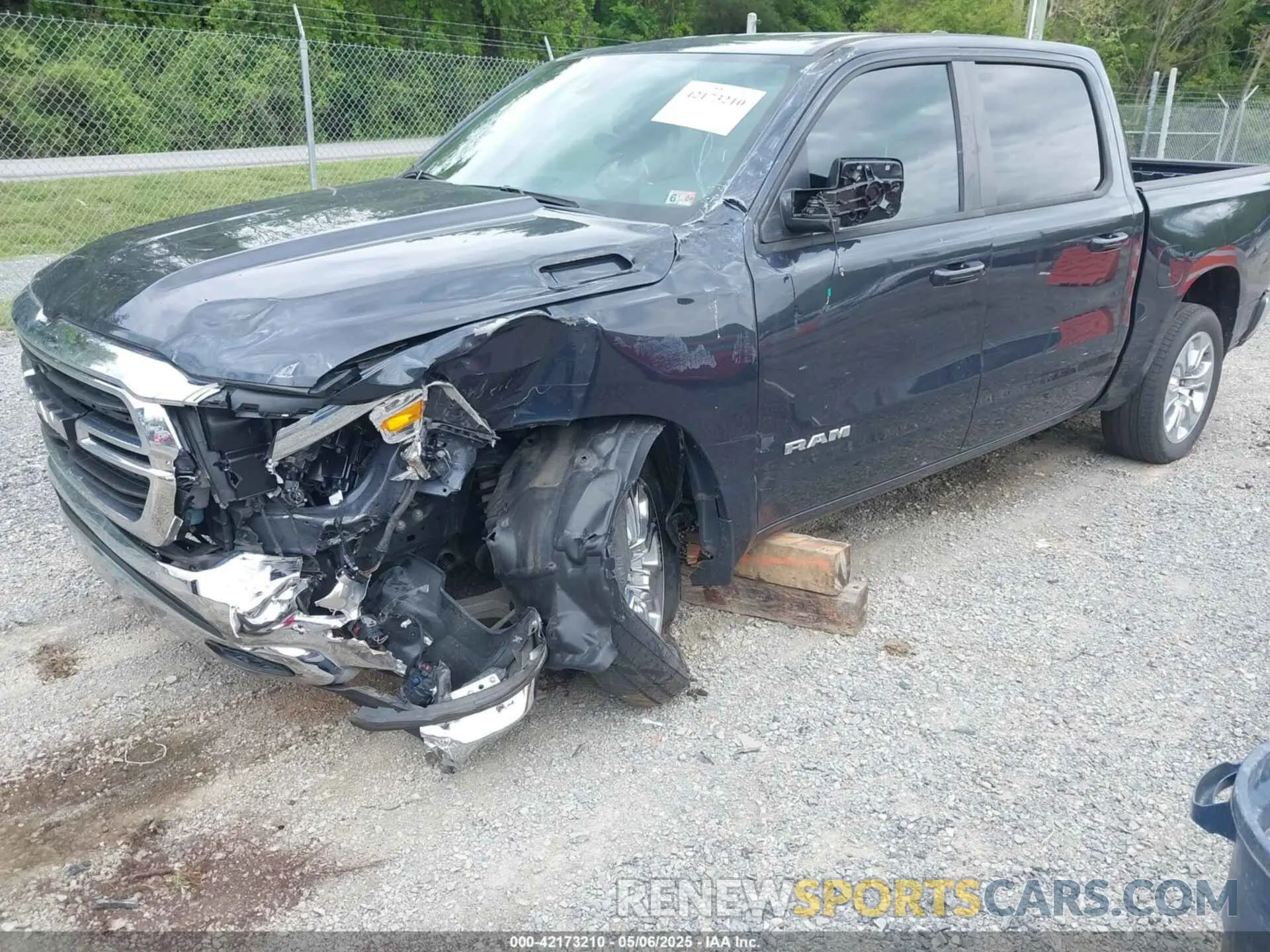 2 Photograph of a damaged car 1C6SRFFT1MN647851 RAM 1500 2021
