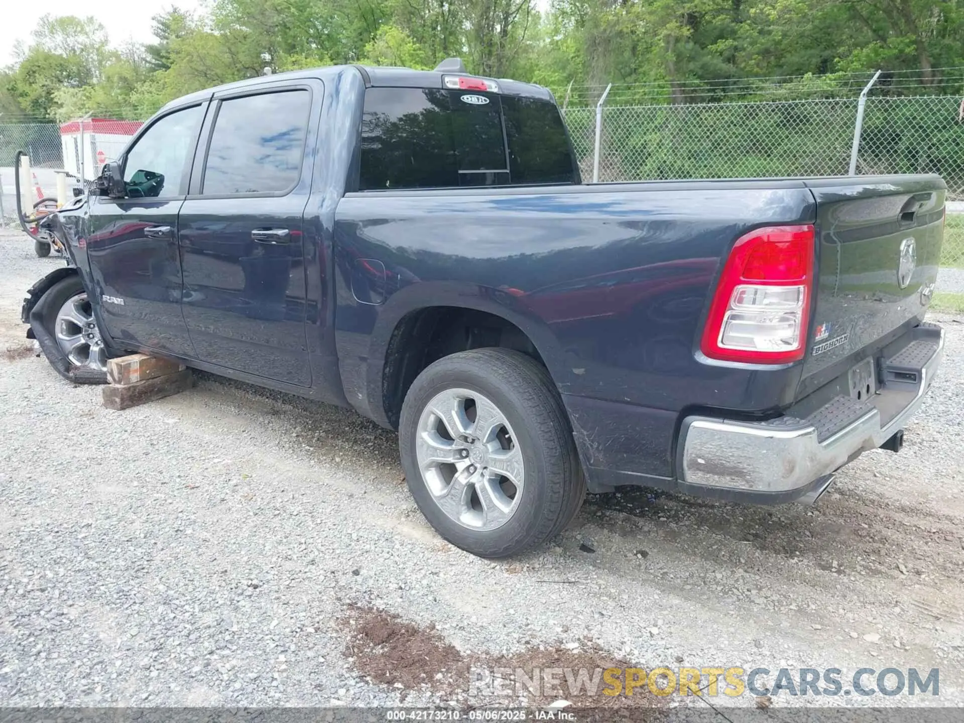 3 Photograph of a damaged car 1C6SRFFT1MN647851 RAM 1500 2021