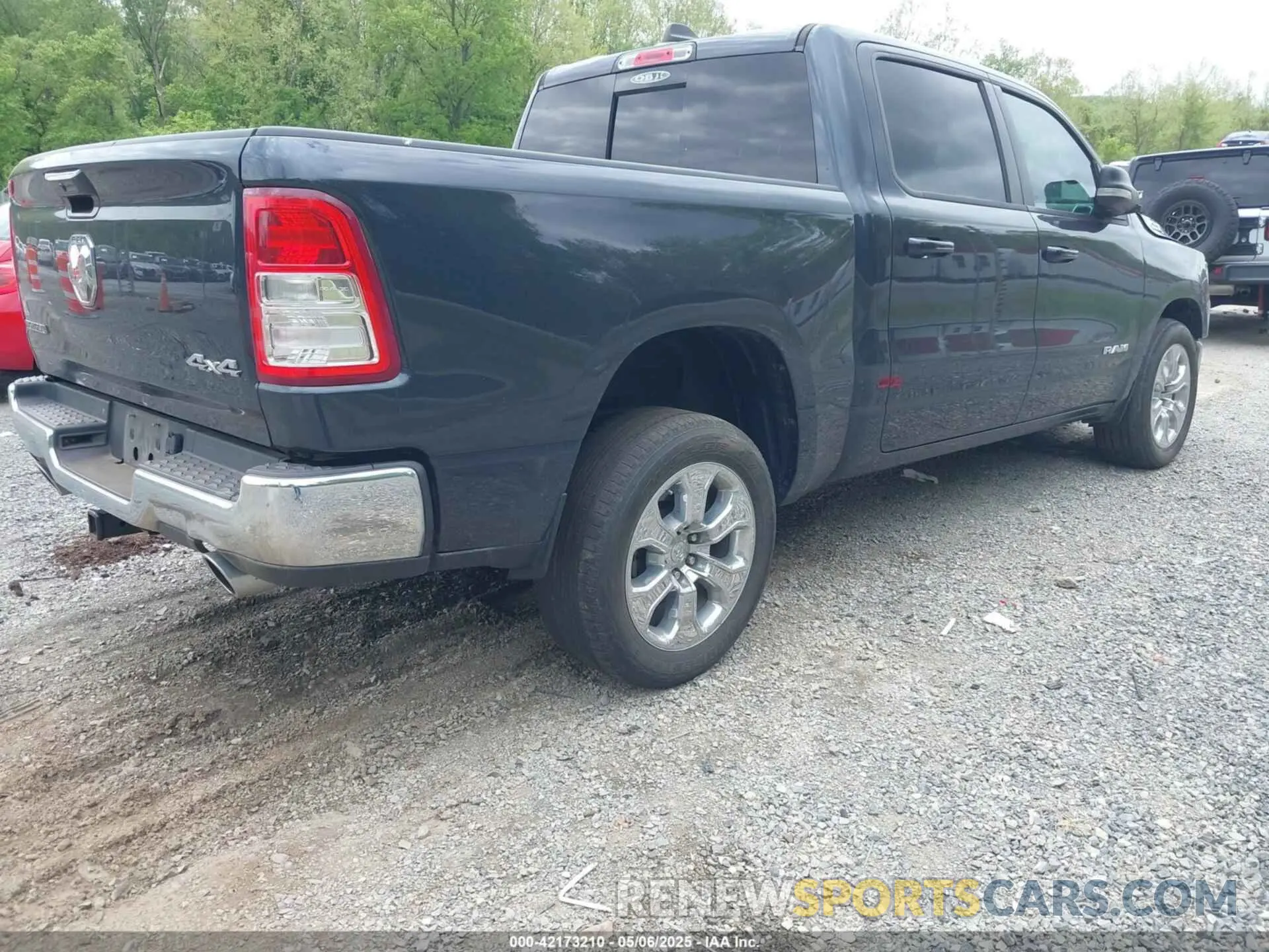 4 Photograph of a damaged car 1C6SRFFT1MN647851 RAM 1500 2021