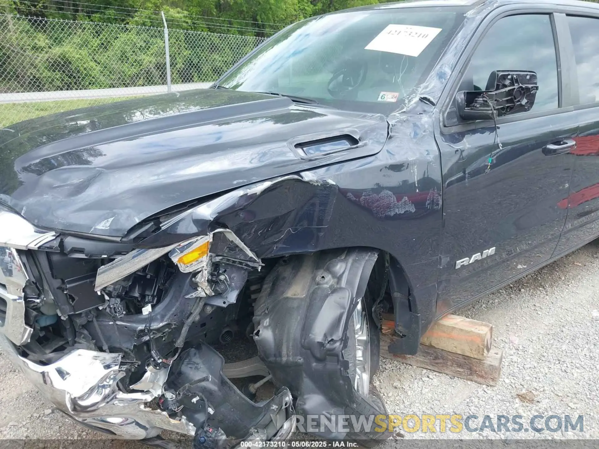 6 Photograph of a damaged car 1C6SRFFT1MN647851 RAM 1500 2021