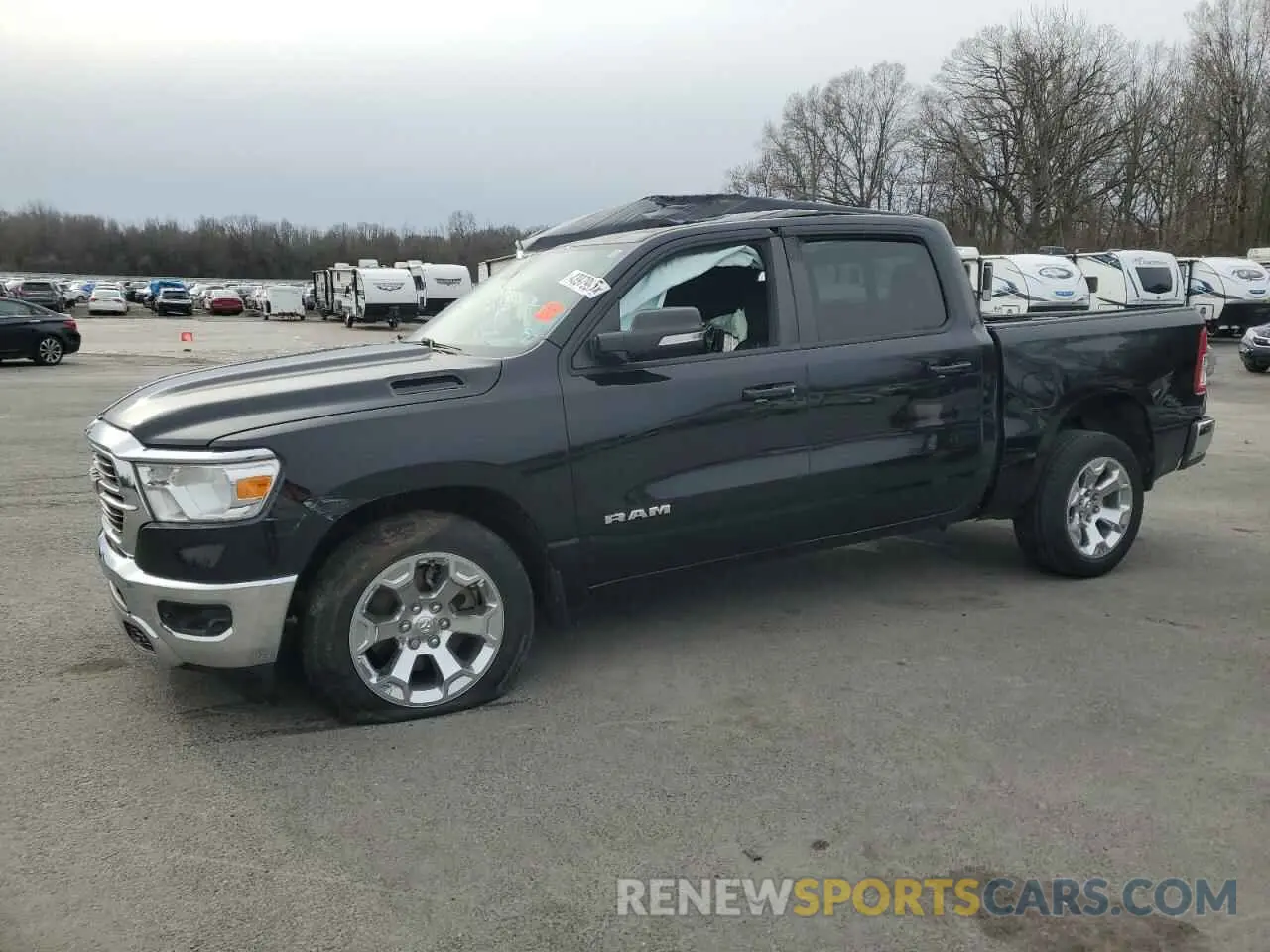 1 Photograph of a damaged car 1C6SRFFT1MN668148 RAM 1500 2021