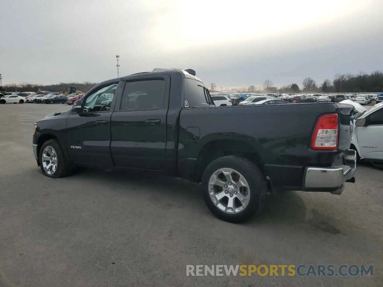 2 Photograph of a damaged car 1C6SRFFT1MN668148 RAM 1500 2021