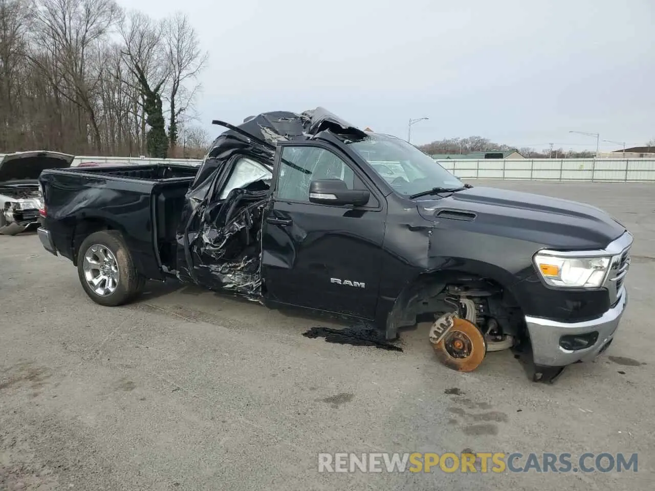 4 Photograph of a damaged car 1C6SRFFT1MN668148 RAM 1500 2021