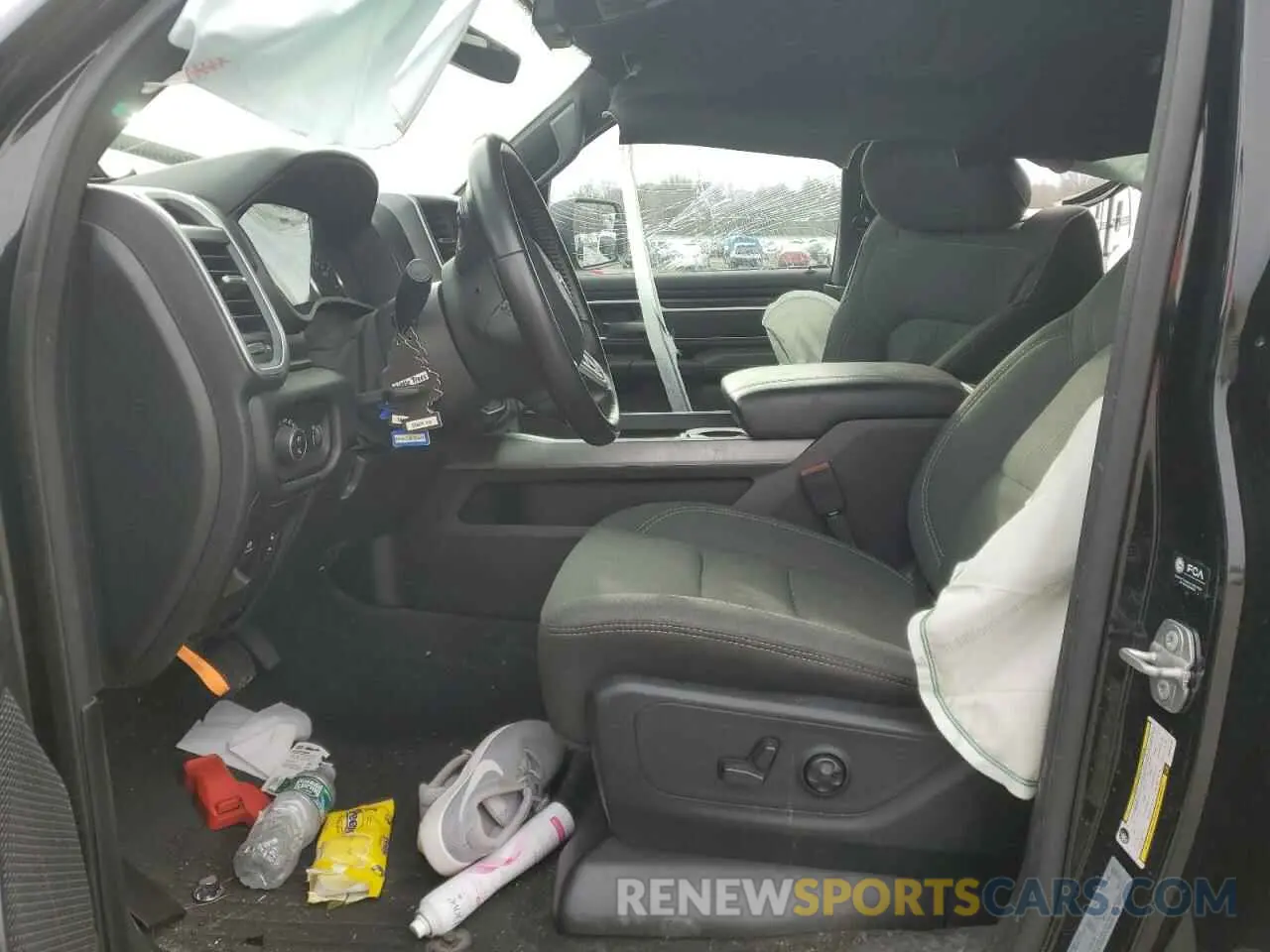 7 Photograph of a damaged car 1C6SRFFT1MN668148 RAM 1500 2021