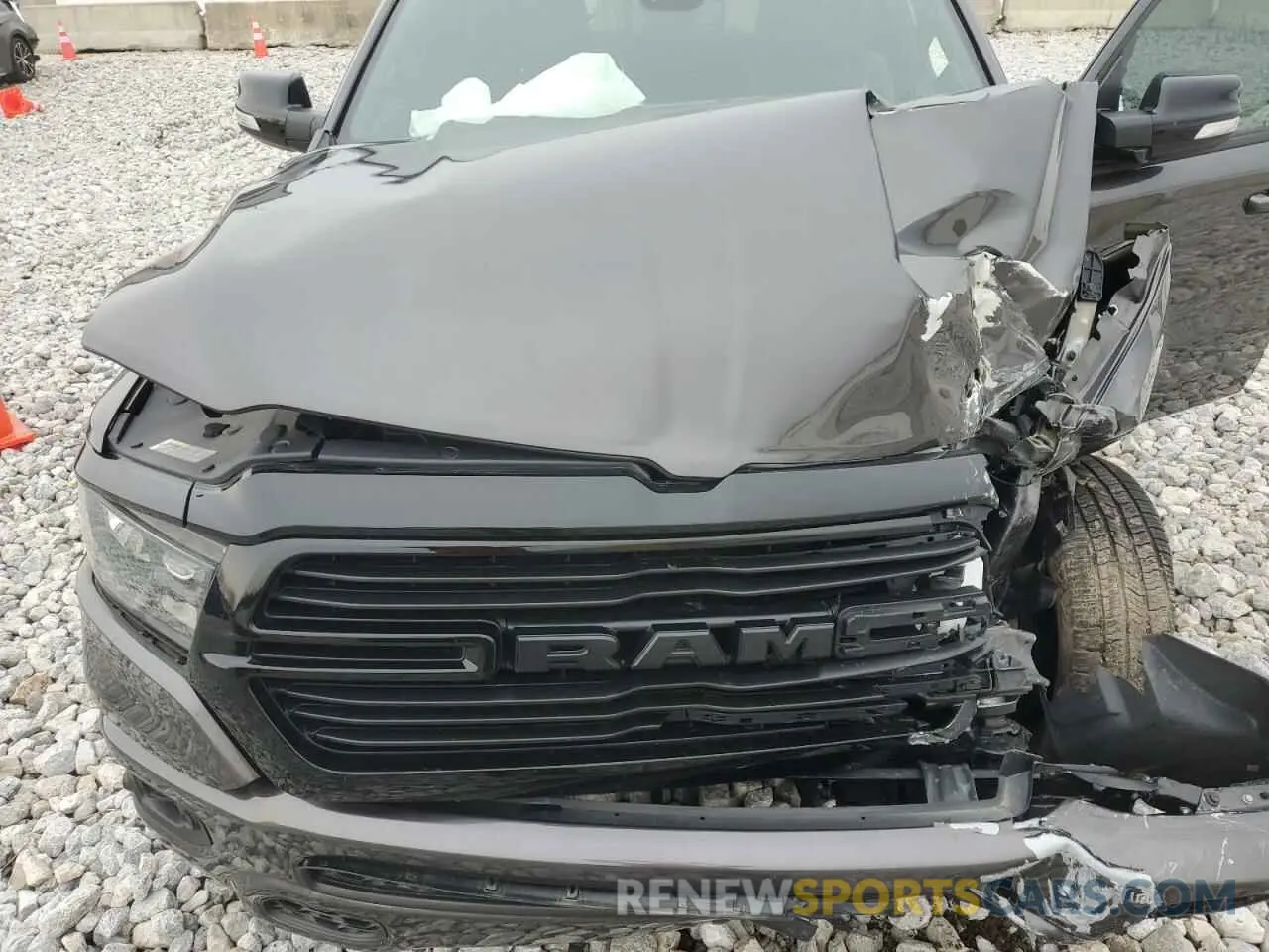 11 Photograph of a damaged car 1C6SRFFT1MN673978 RAM 1500 2021