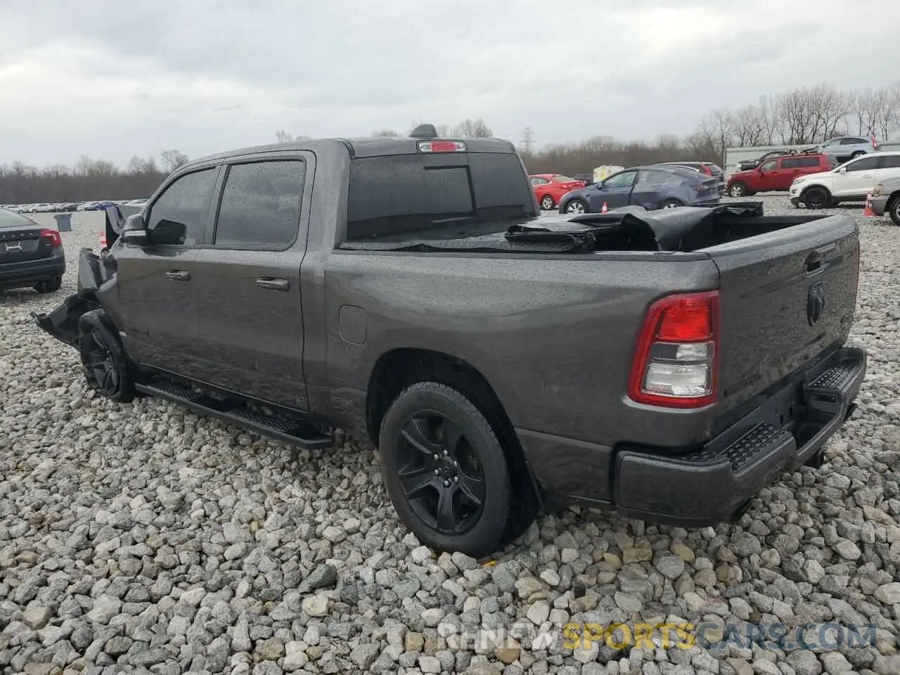 2 Photograph of a damaged car 1C6SRFFT1MN673978 RAM 1500 2021