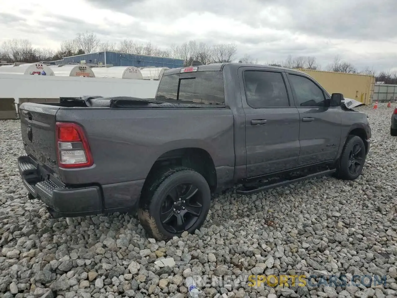 3 Photograph of a damaged car 1C6SRFFT1MN673978 RAM 1500 2021