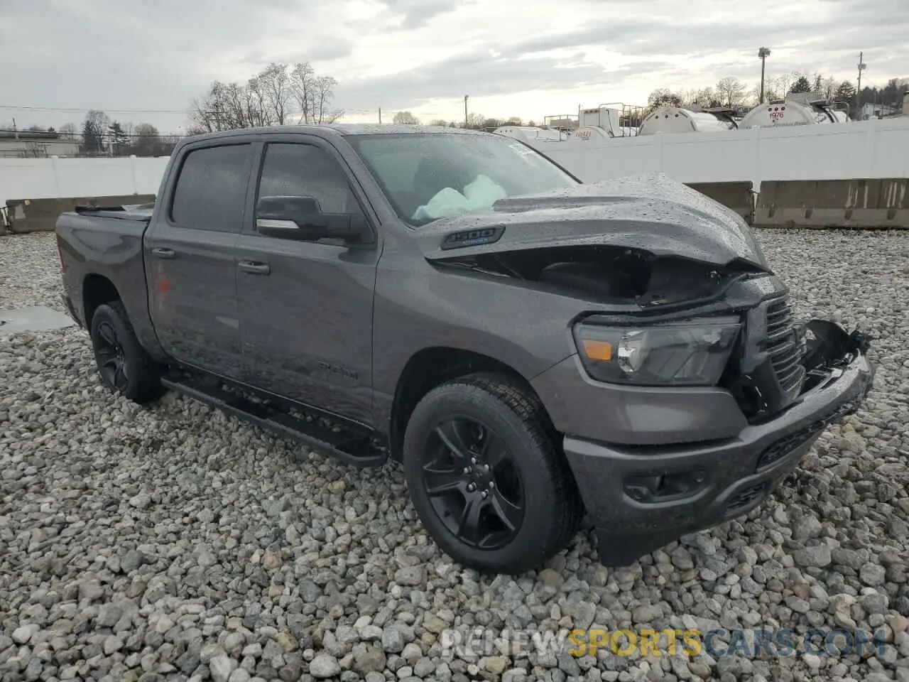 4 Photograph of a damaged car 1C6SRFFT1MN673978 RAM 1500 2021