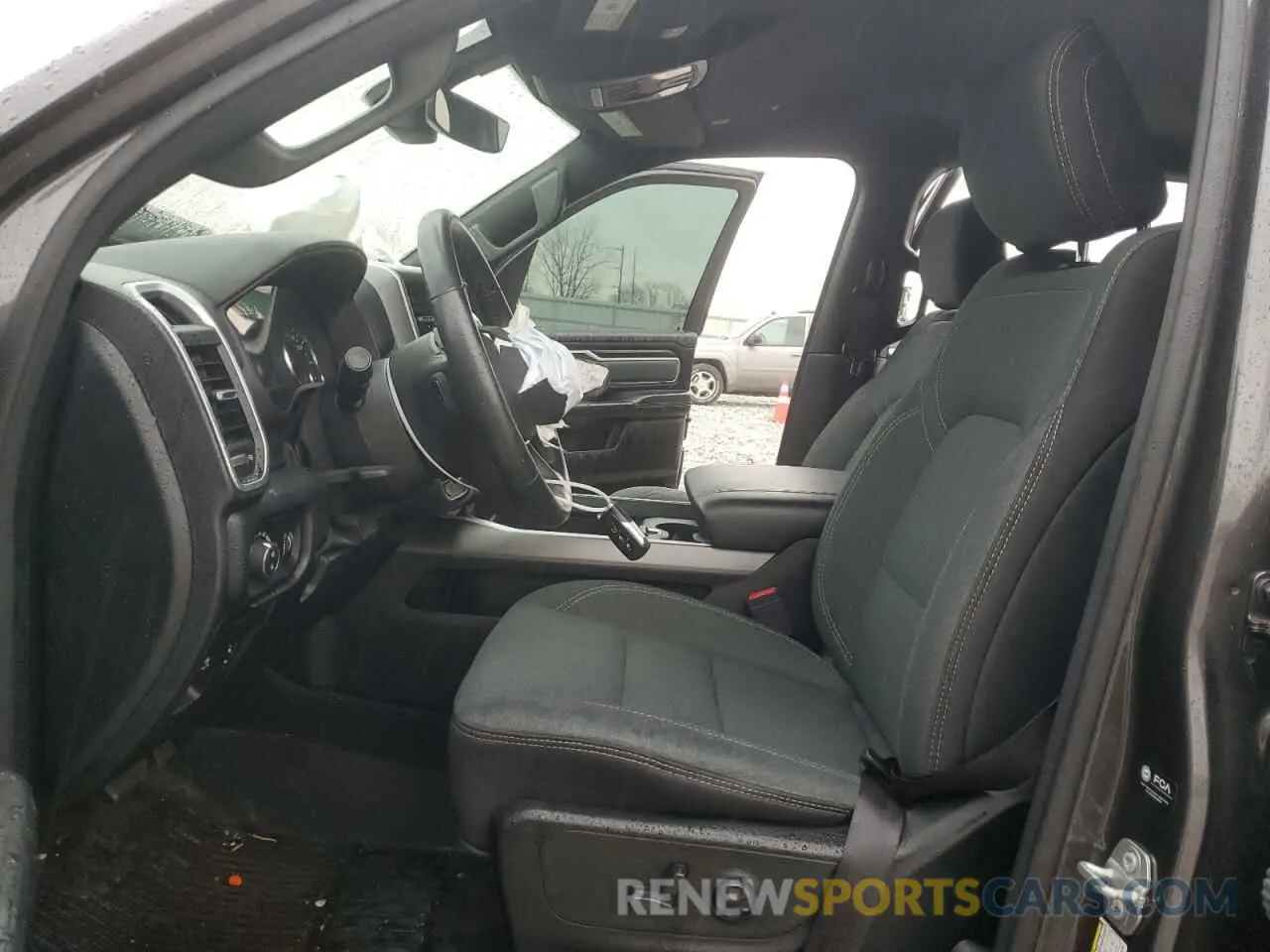 7 Photograph of a damaged car 1C6SRFFT1MN673978 RAM 1500 2021