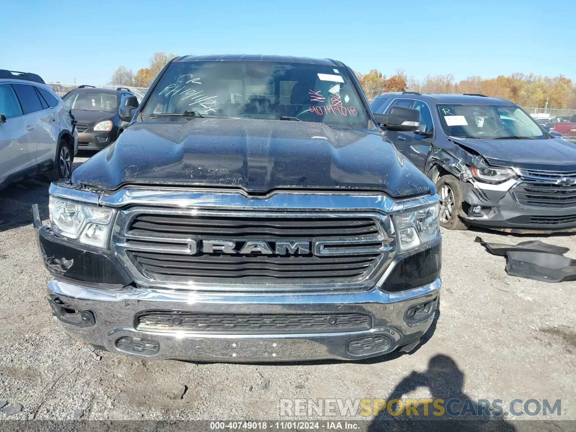 12 Photograph of a damaged car 1C6SRFFT1MN692725 RAM 1500 2021