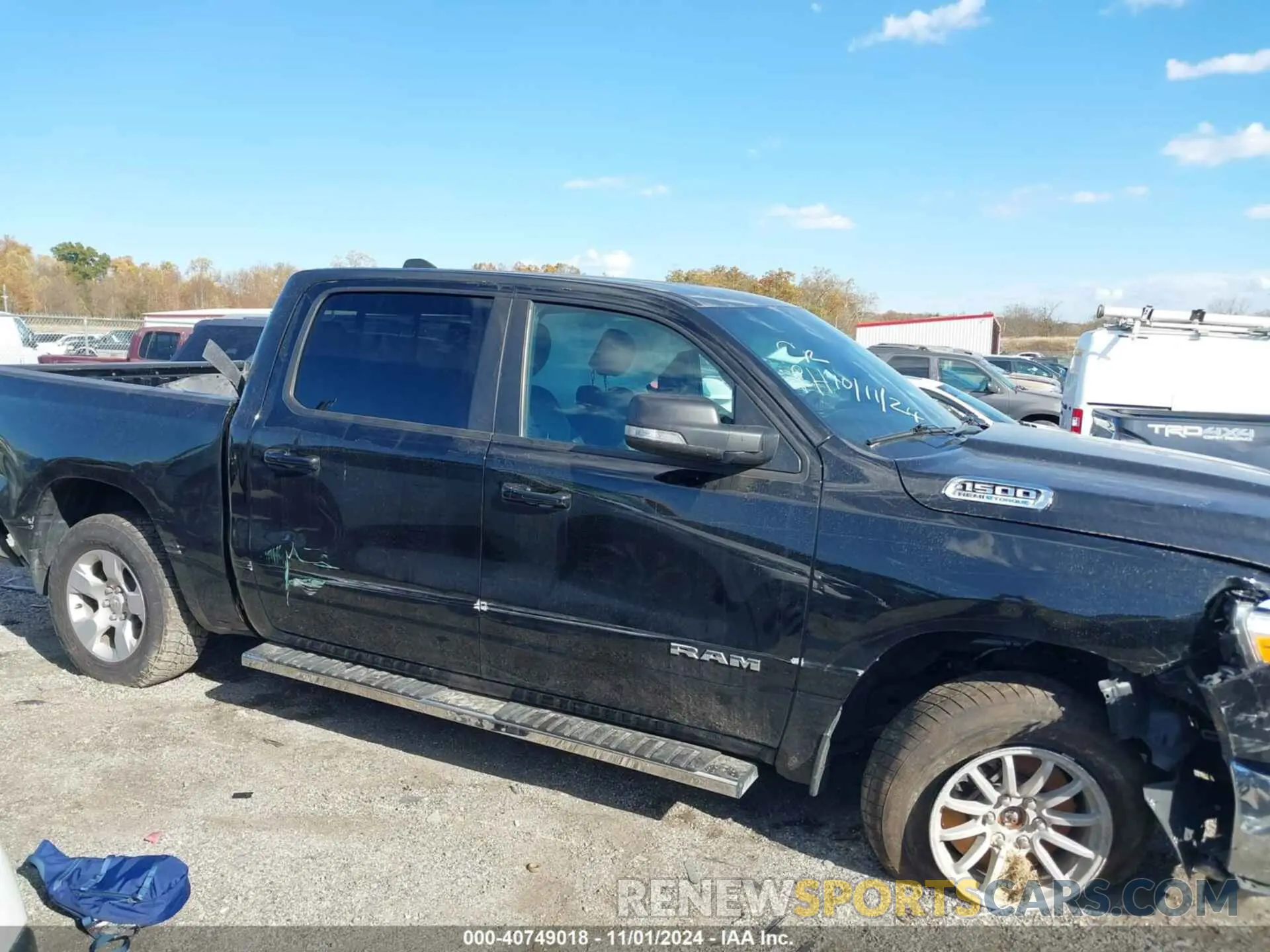 13 Photograph of a damaged car 1C6SRFFT1MN692725 RAM 1500 2021