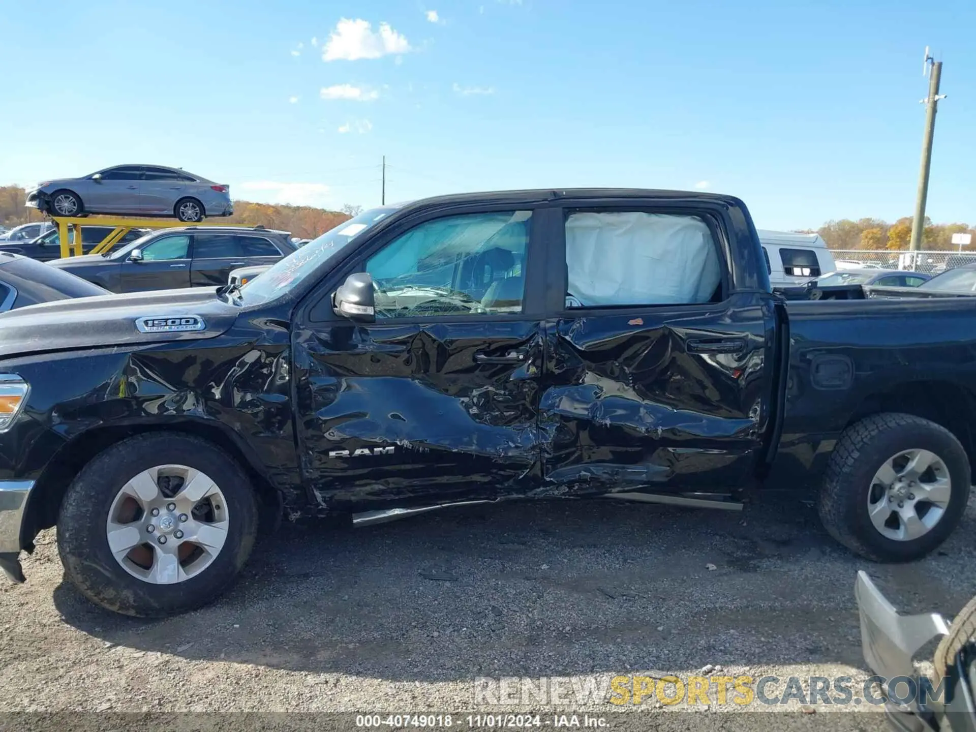14 Photograph of a damaged car 1C6SRFFT1MN692725 RAM 1500 2021