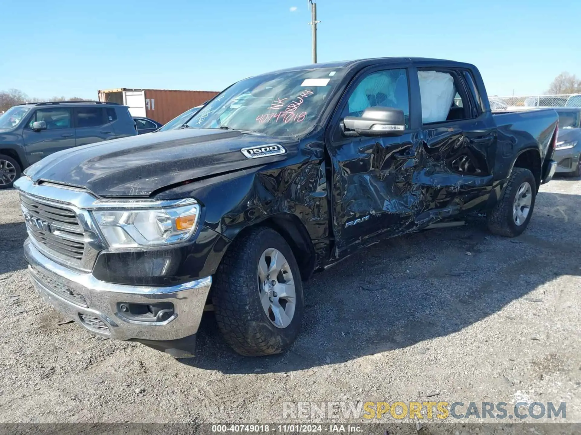 2 Photograph of a damaged car 1C6SRFFT1MN692725 RAM 1500 2021