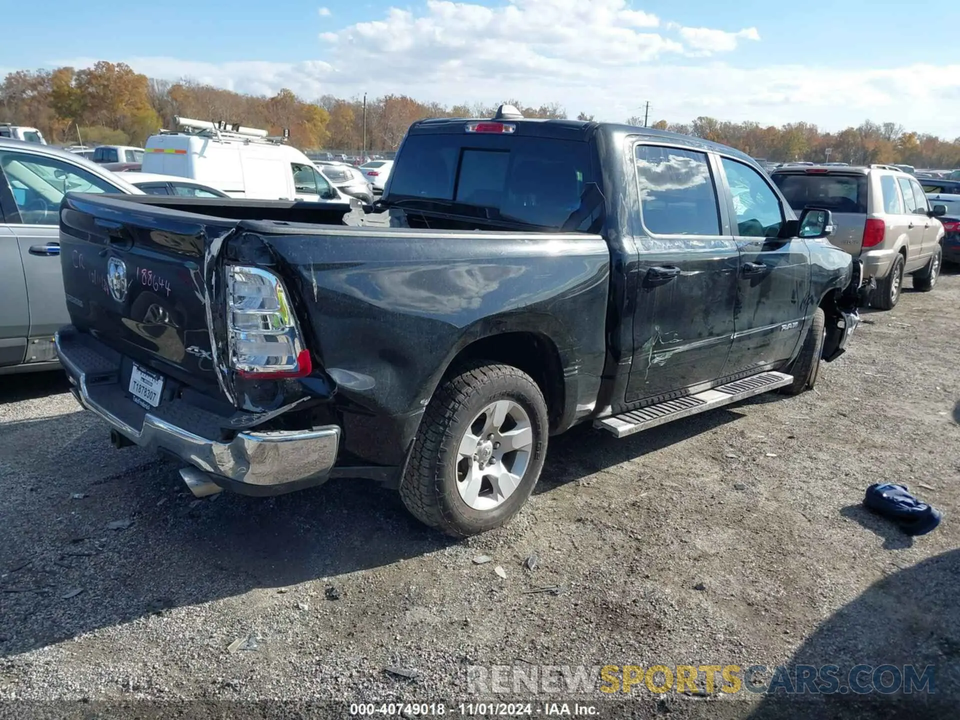 4 Photograph of a damaged car 1C6SRFFT1MN692725 RAM 1500 2021