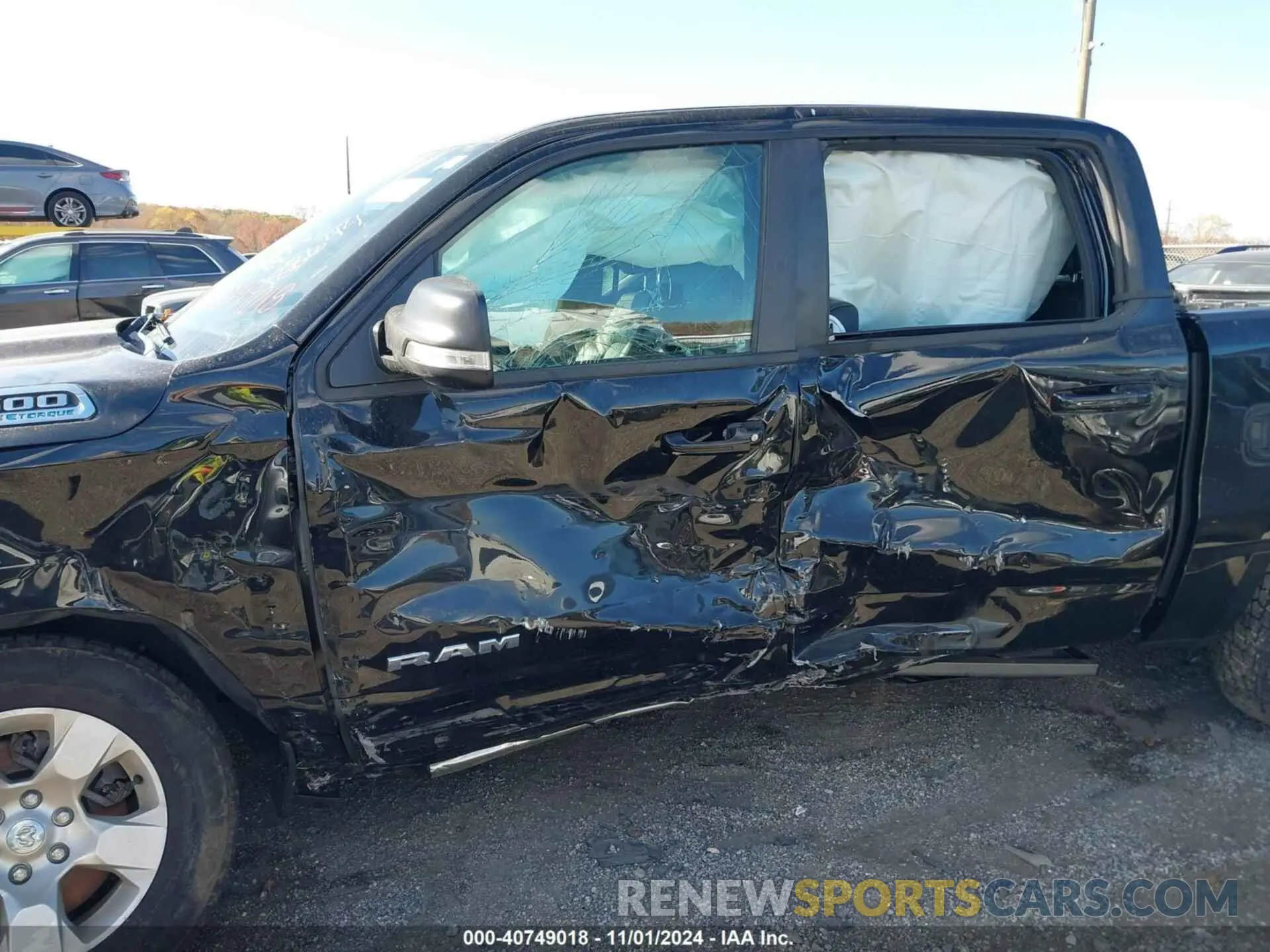6 Photograph of a damaged car 1C6SRFFT1MN692725 RAM 1500 2021