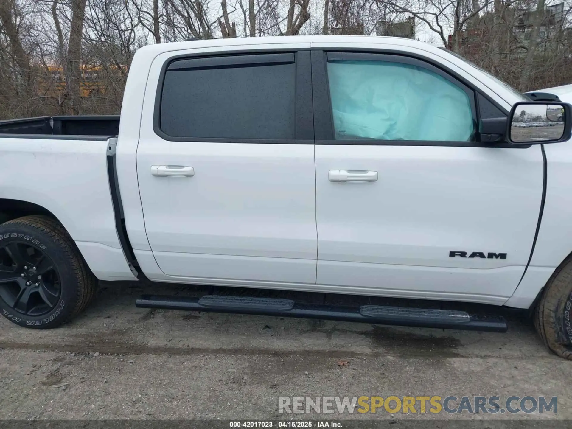 13 Photograph of a damaged car 1C6SRFFT1MN721561 RAM 1500 2021