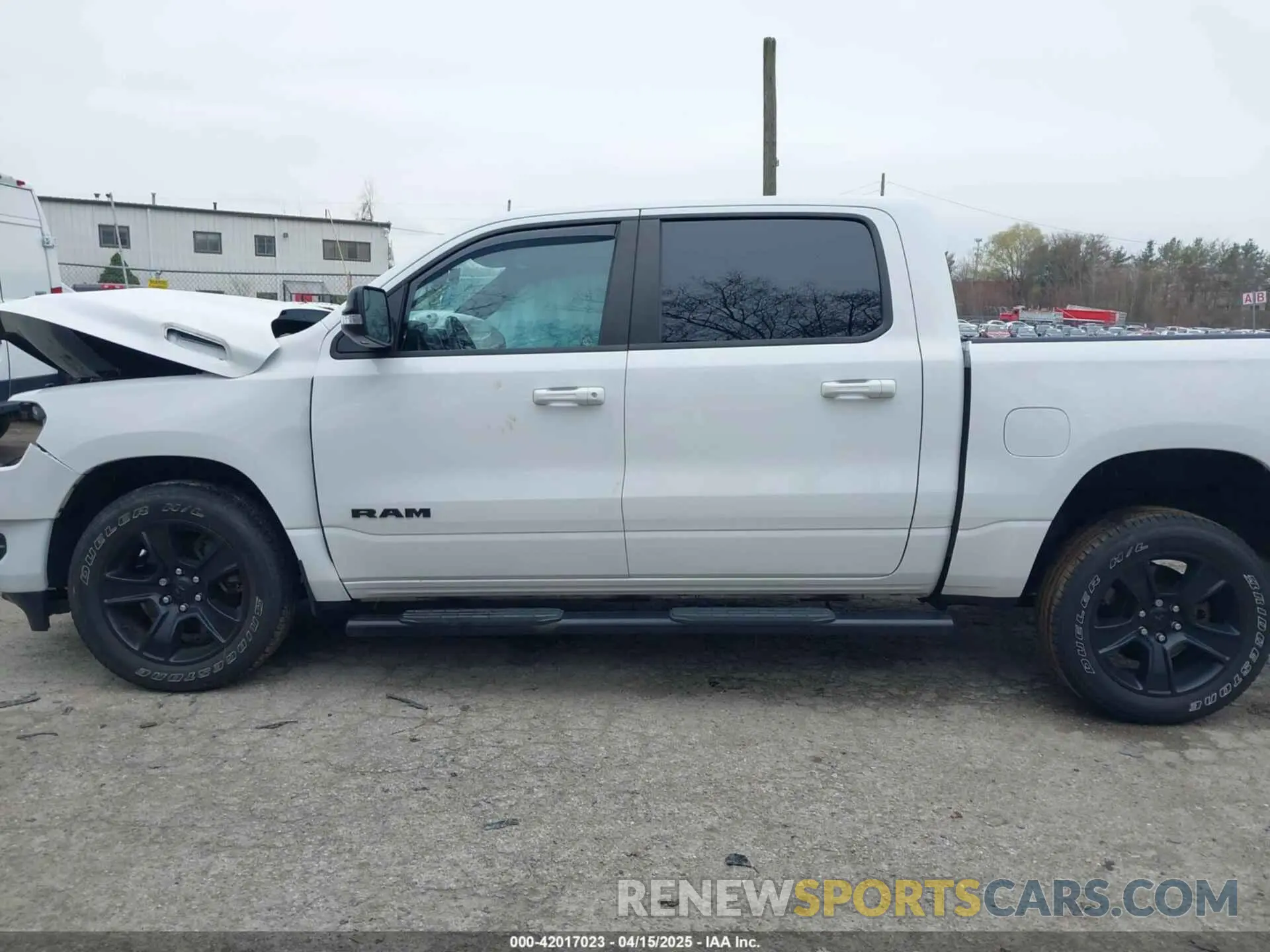 14 Photograph of a damaged car 1C6SRFFT1MN721561 RAM 1500 2021
