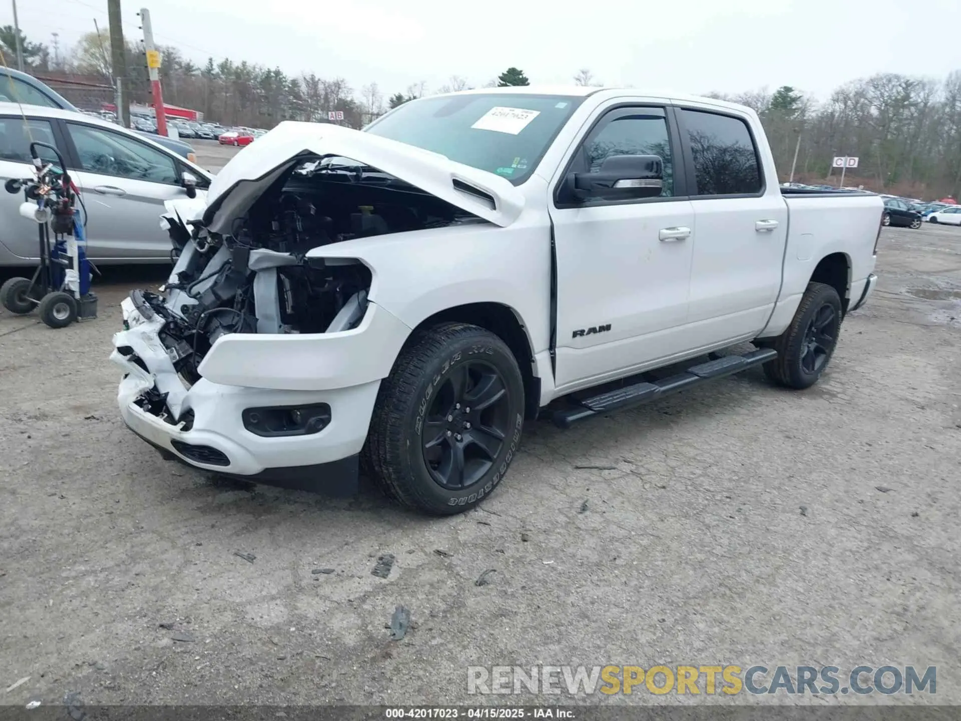 2 Photograph of a damaged car 1C6SRFFT1MN721561 RAM 1500 2021