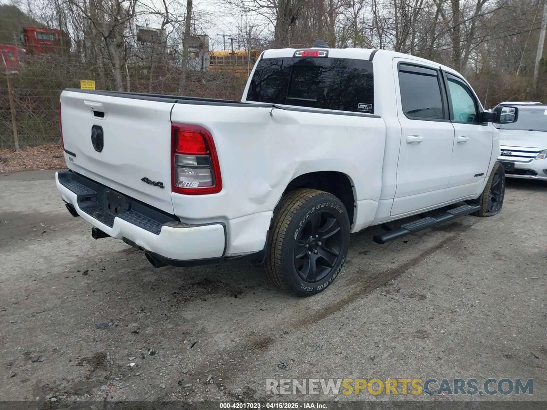 4 Photograph of a damaged car 1C6SRFFT1MN721561 RAM 1500 2021