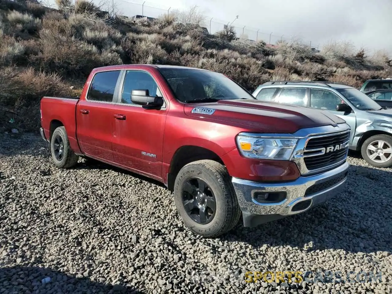 4 Photograph of a damaged car 1C6SRFFT1MN729921 RAM 1500 2021