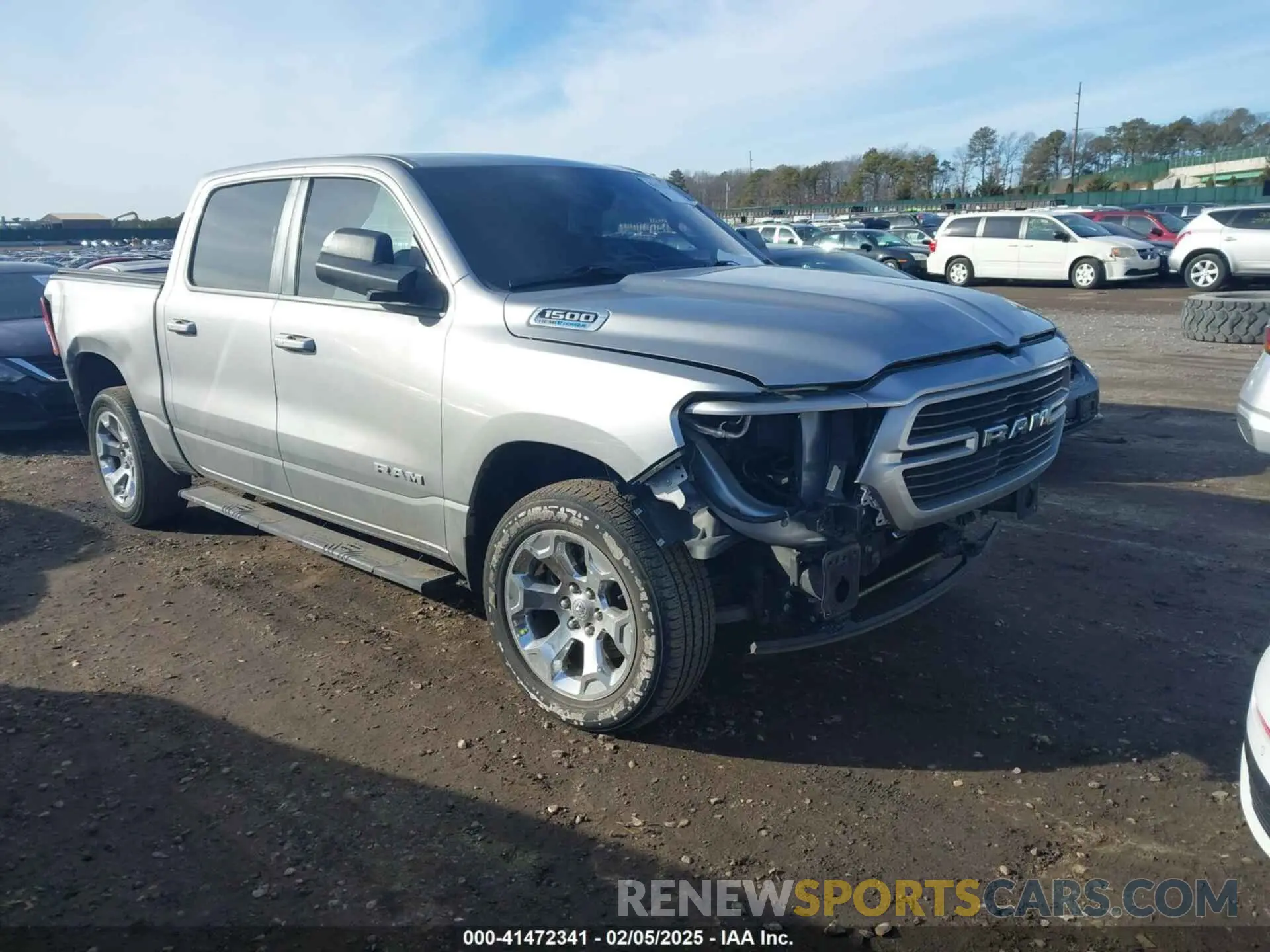 1 Photograph of a damaged car 1C6SRFFT1MN795398 RAM 1500 2021