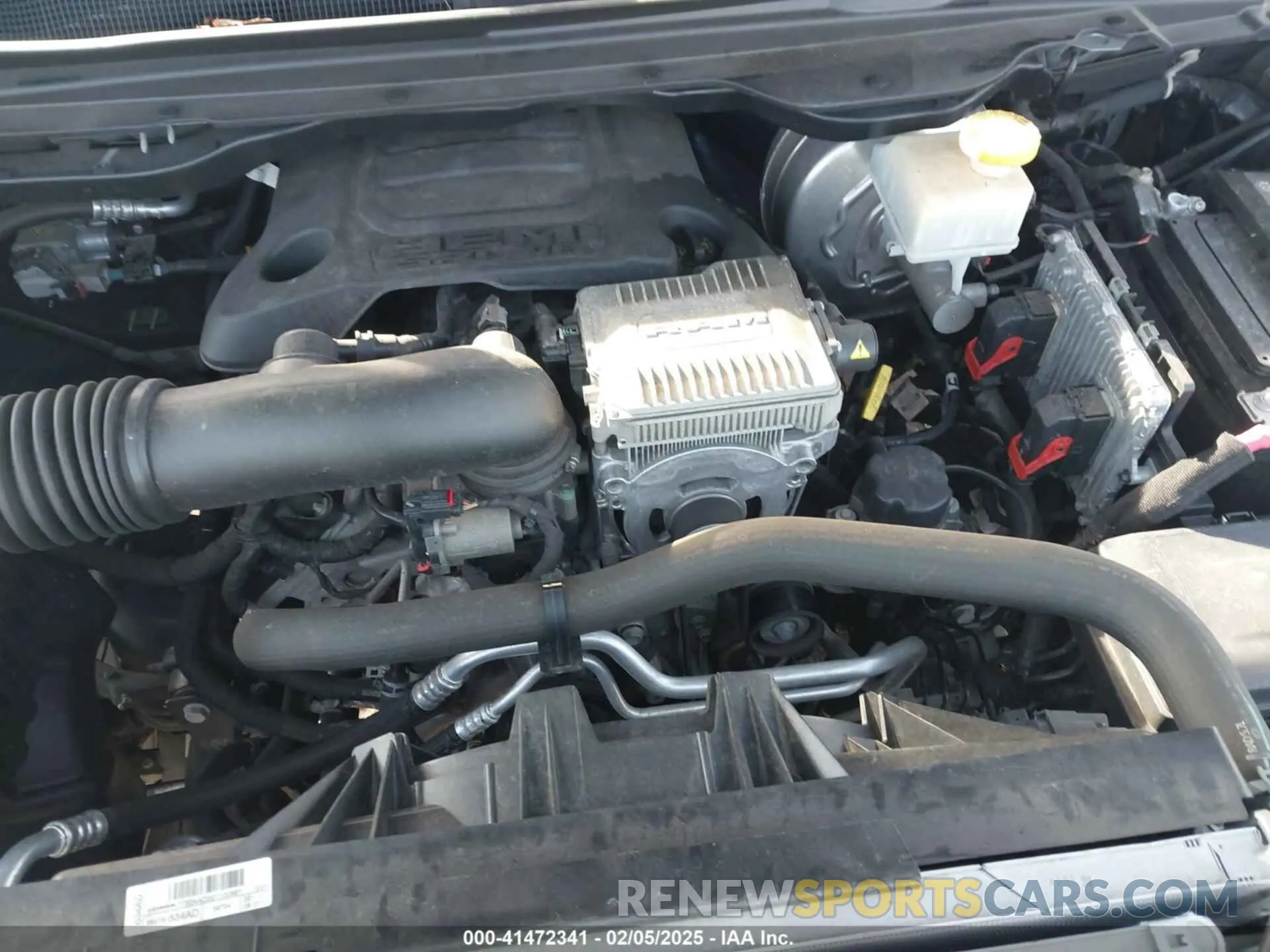 10 Photograph of a damaged car 1C6SRFFT1MN795398 RAM 1500 2021