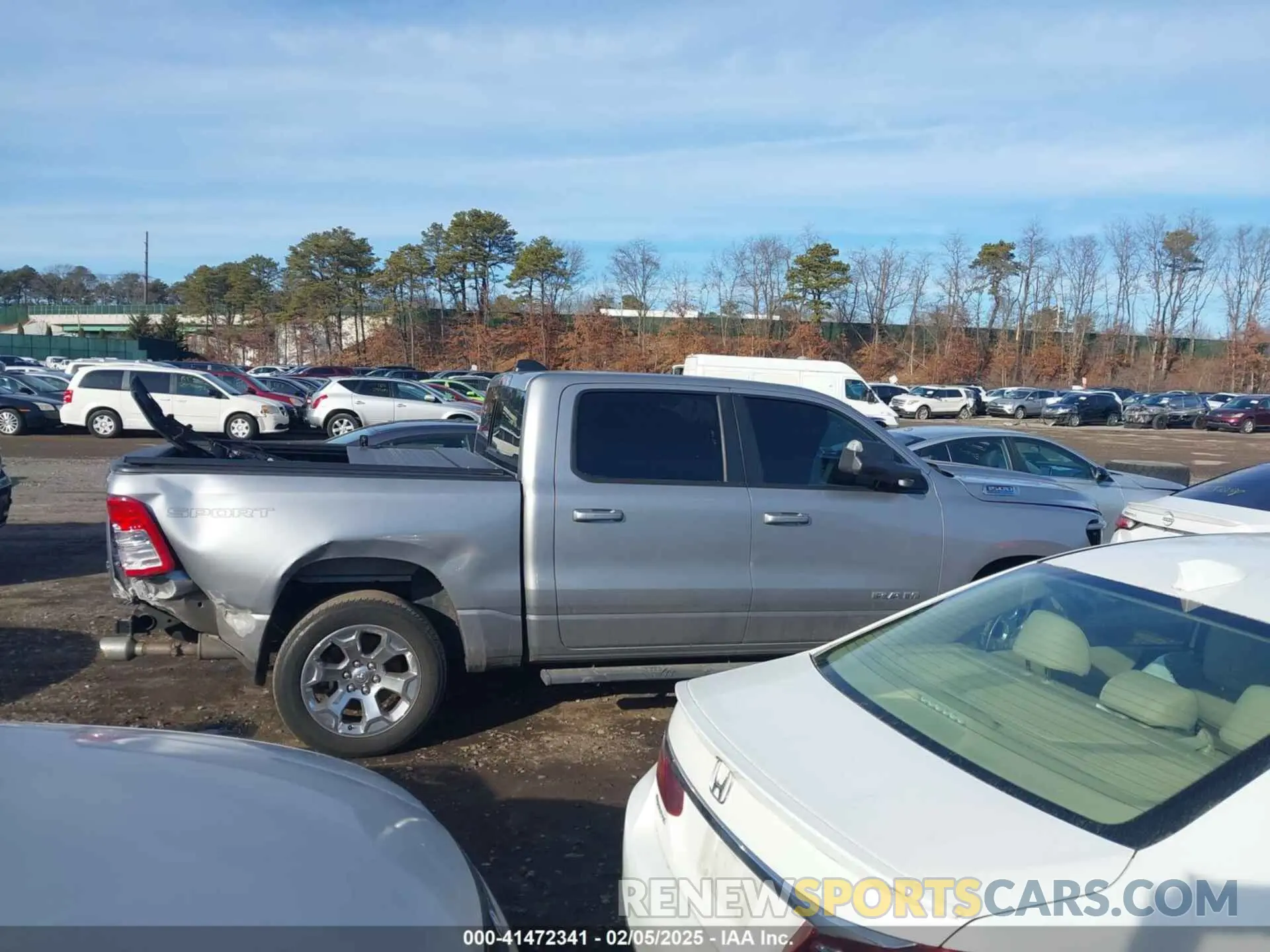 13 Photograph of a damaged car 1C6SRFFT1MN795398 RAM 1500 2021