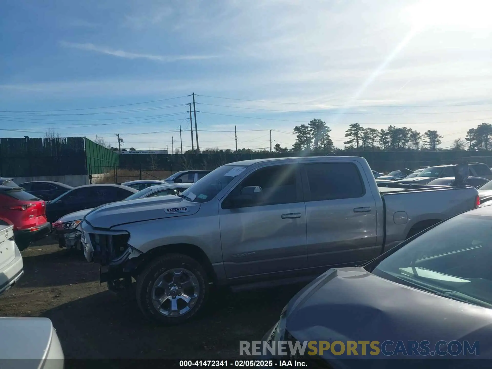 14 Photograph of a damaged car 1C6SRFFT1MN795398 RAM 1500 2021