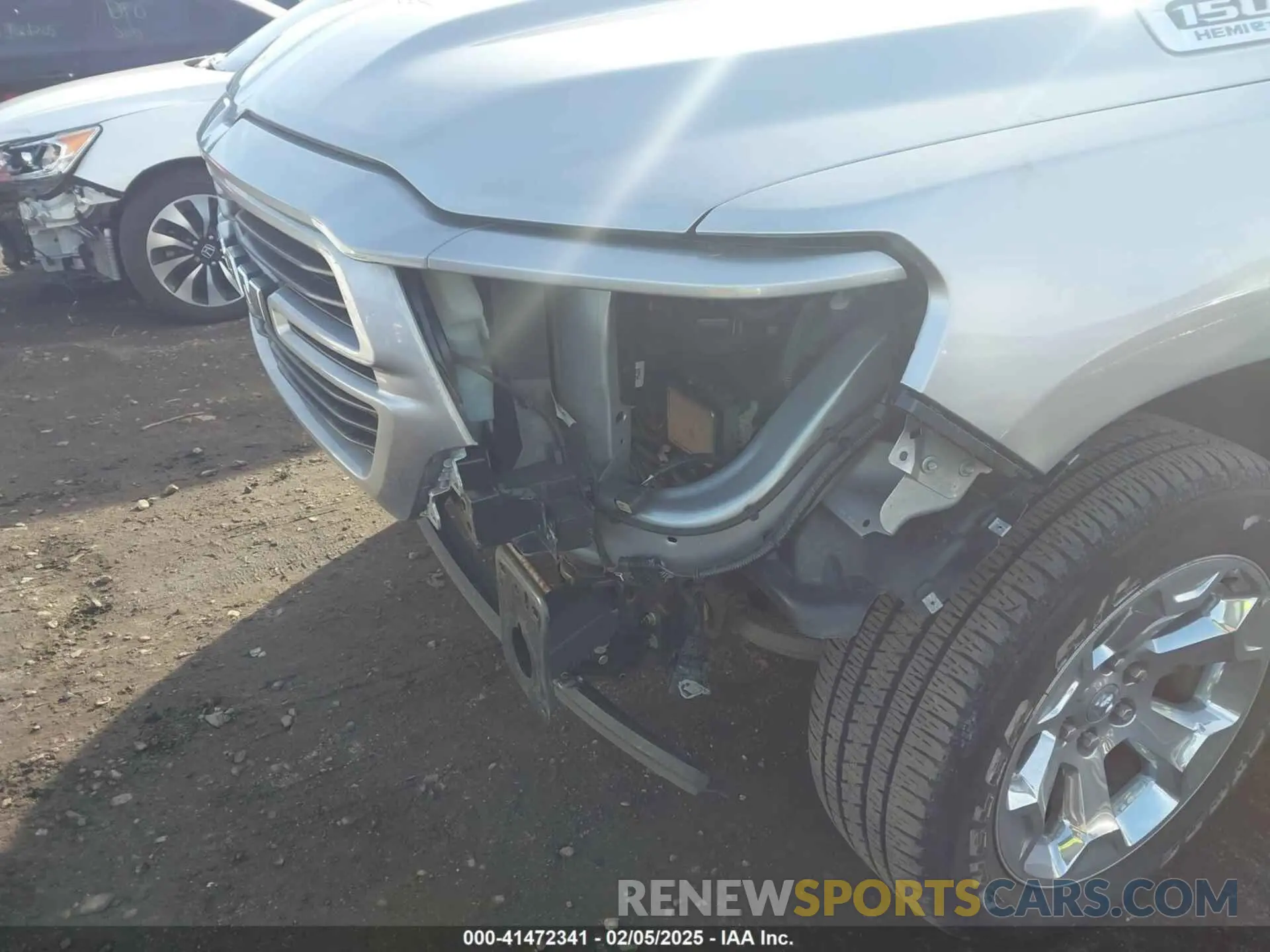 17 Photograph of a damaged car 1C6SRFFT1MN795398 RAM 1500 2021