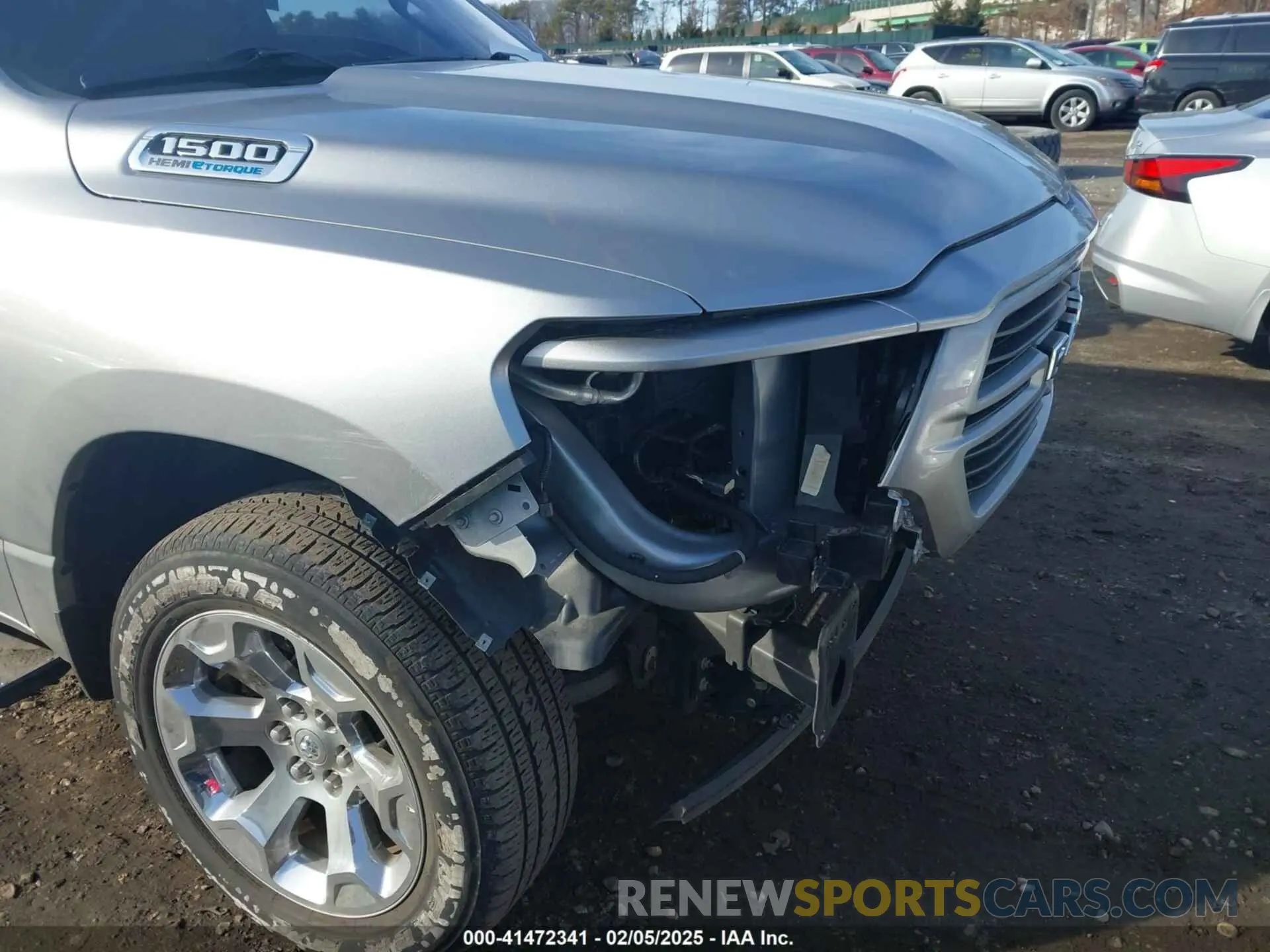 18 Photograph of a damaged car 1C6SRFFT1MN795398 RAM 1500 2021