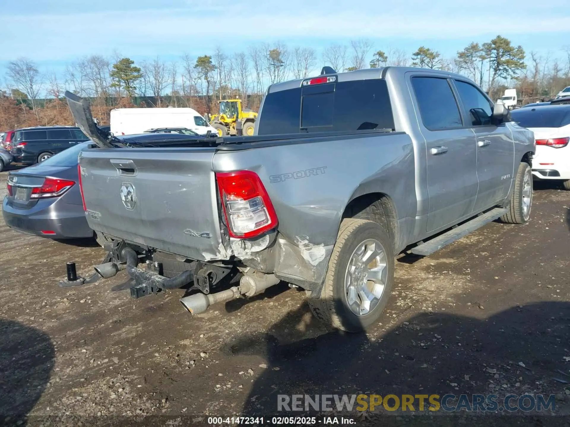 4 Photograph of a damaged car 1C6SRFFT1MN795398 RAM 1500 2021