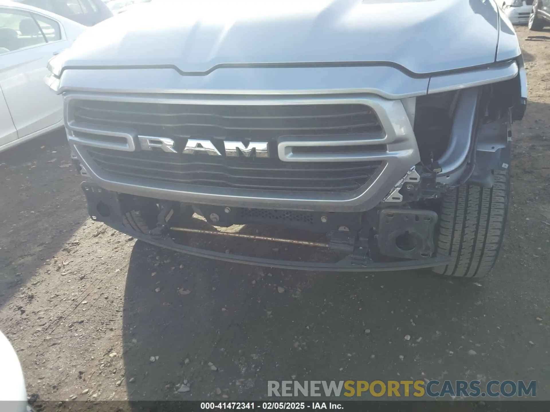 6 Photograph of a damaged car 1C6SRFFT1MN795398 RAM 1500 2021