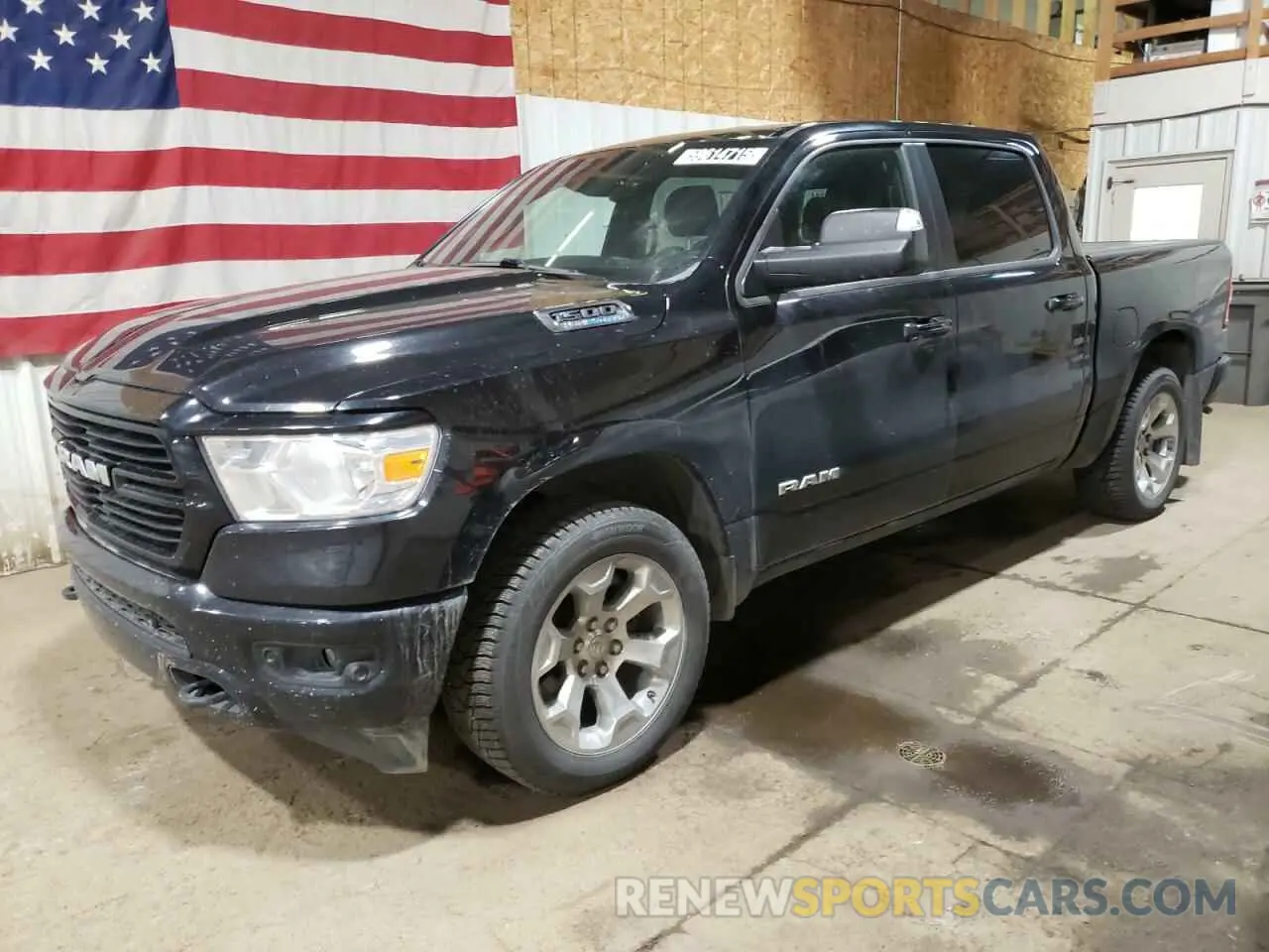 1 Photograph of a damaged car 1C6SRFFT1MN804715 RAM 1500 2021
