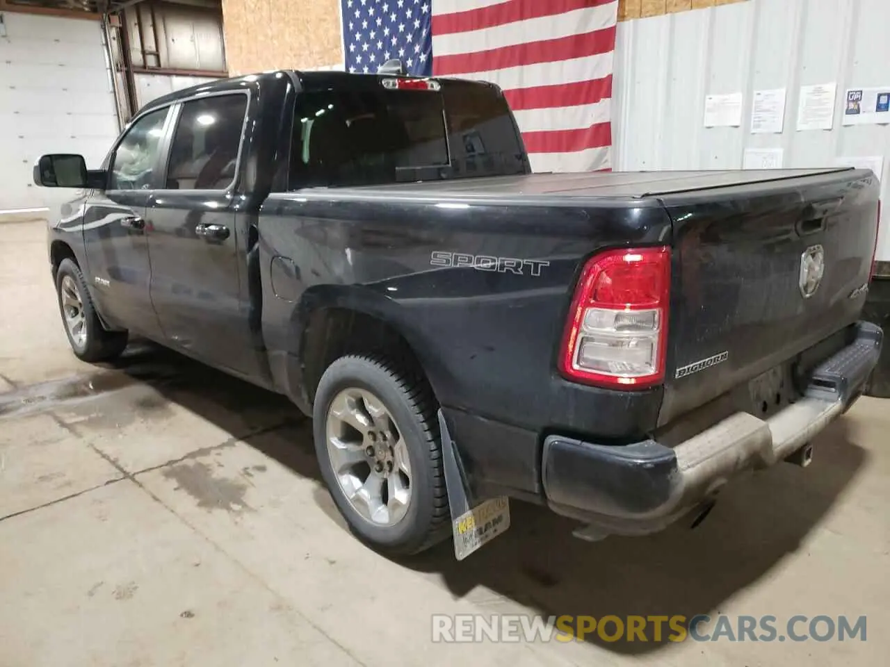 2 Photograph of a damaged car 1C6SRFFT1MN804715 RAM 1500 2021