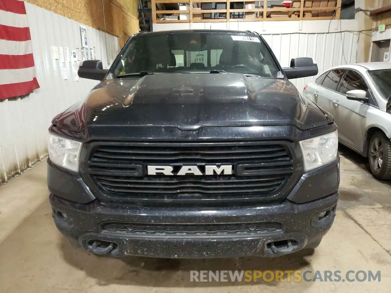 5 Photograph of a damaged car 1C6SRFFT1MN804715 RAM 1500 2021