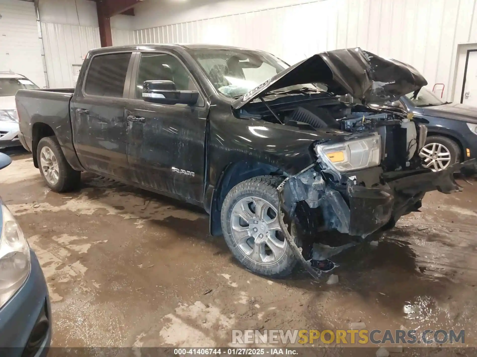 1 Photograph of a damaged car 1C6SRFFT2MN547225 RAM 1500 2021