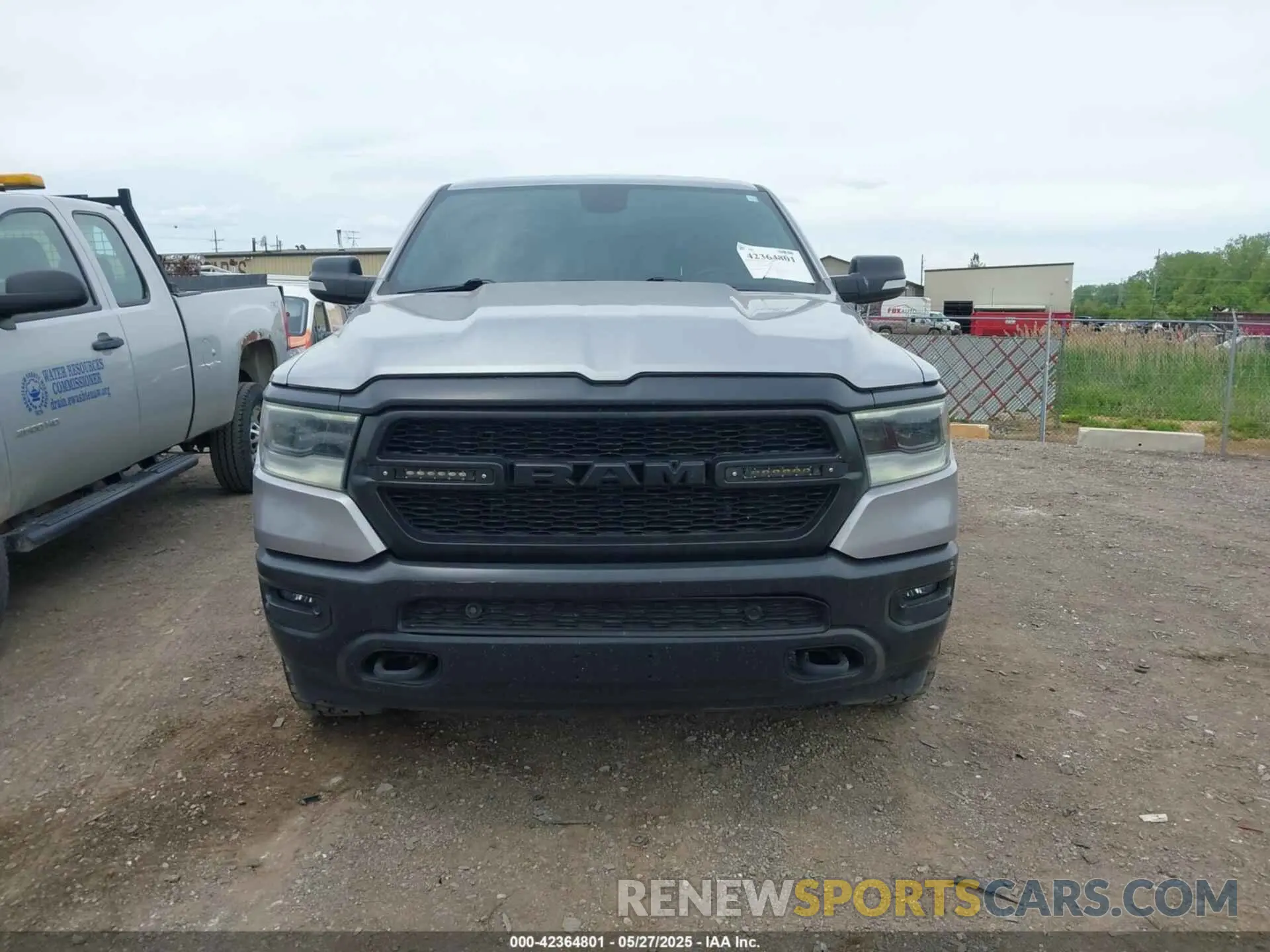 12 Photograph of a damaged car 1C6SRFFT2MN597123 RAM 1500 2021