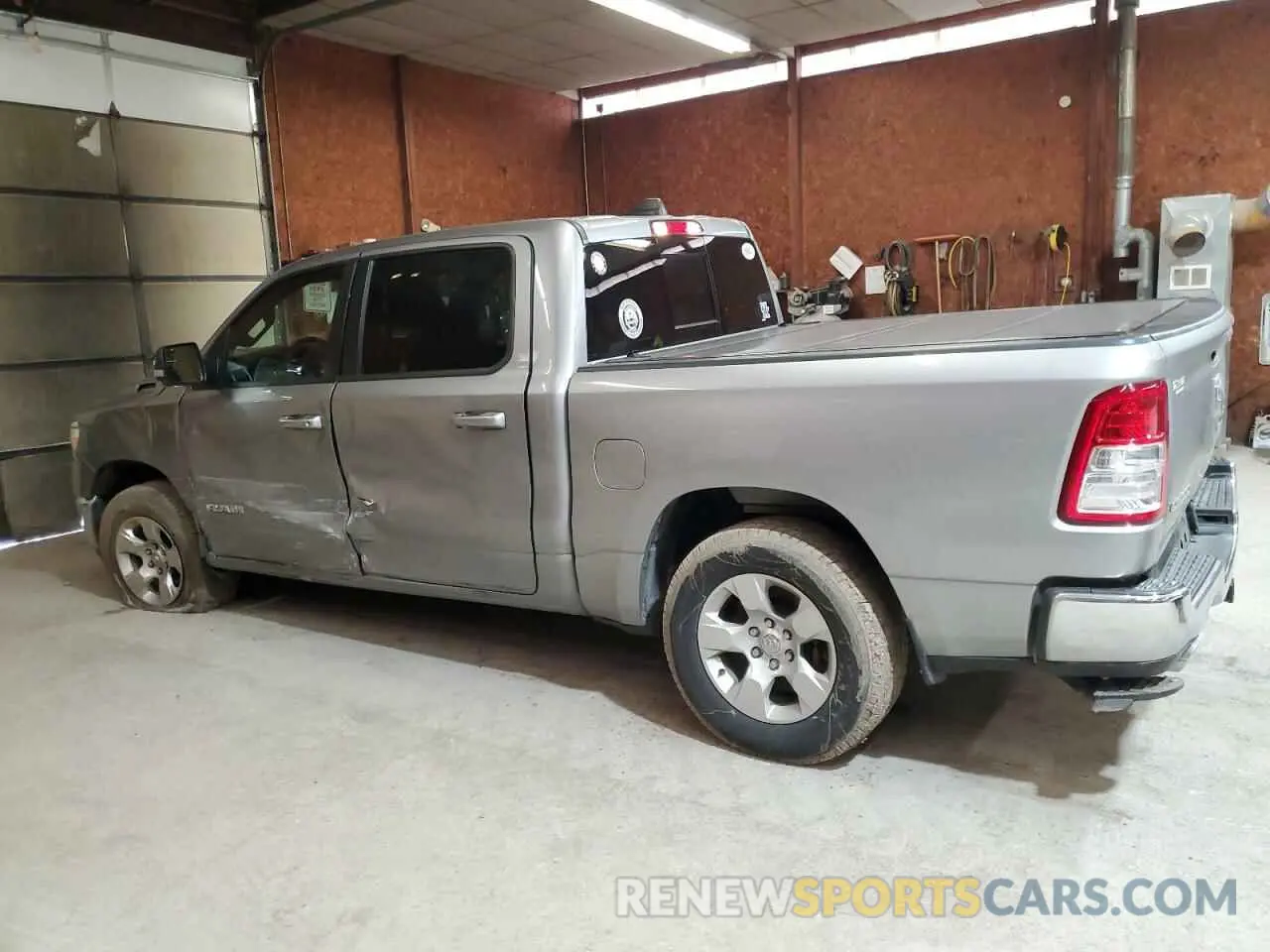 2 Photograph of a damaged car 1C6SRFFT2MN597705 RAM 1500 2021