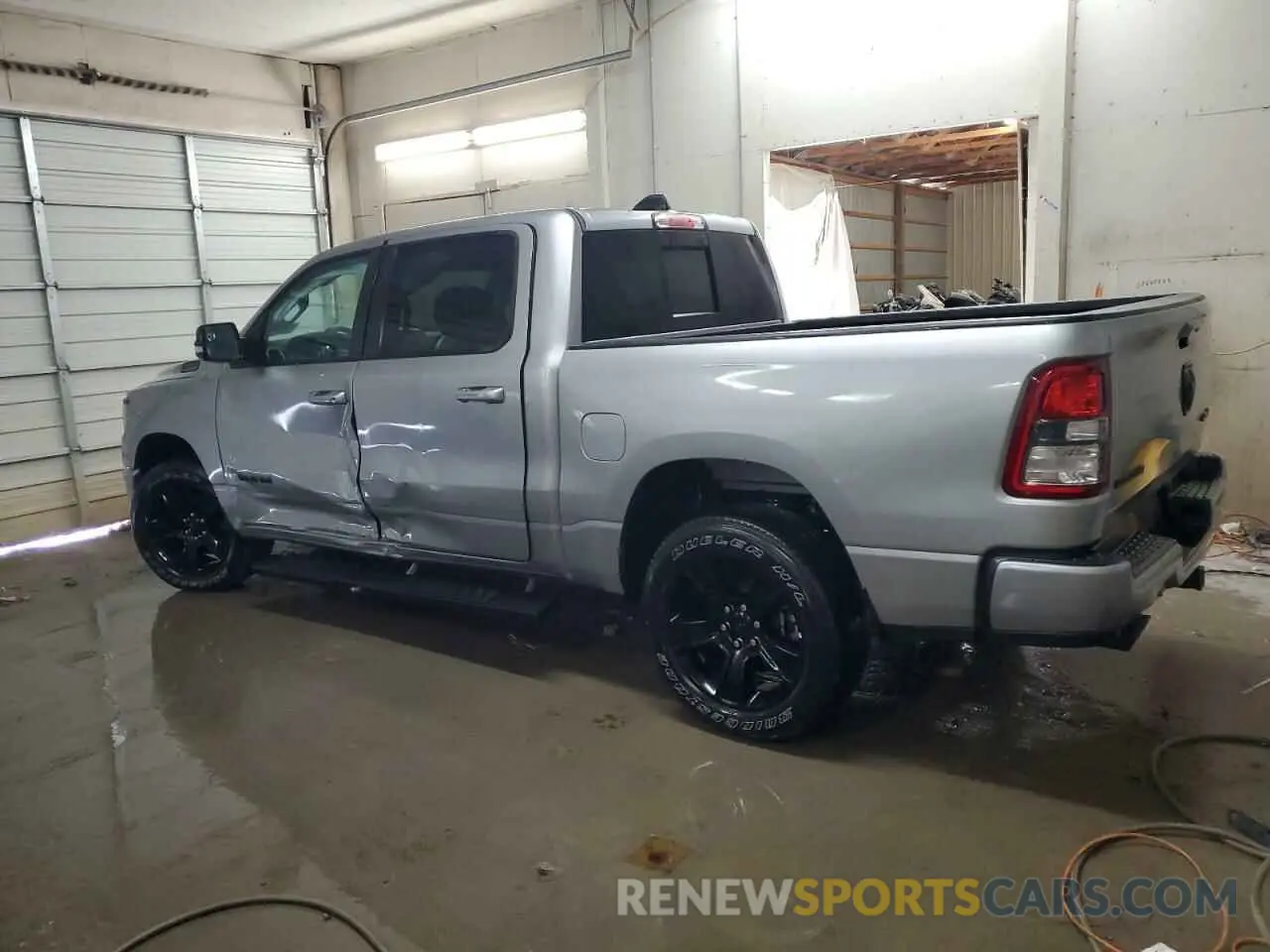 2 Photograph of a damaged car 1C6SRFFT2MN598580 RAM 1500 2021