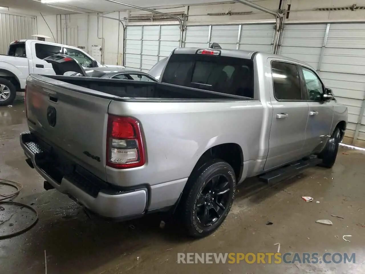 3 Photograph of a damaged car 1C6SRFFT2MN598580 RAM 1500 2021