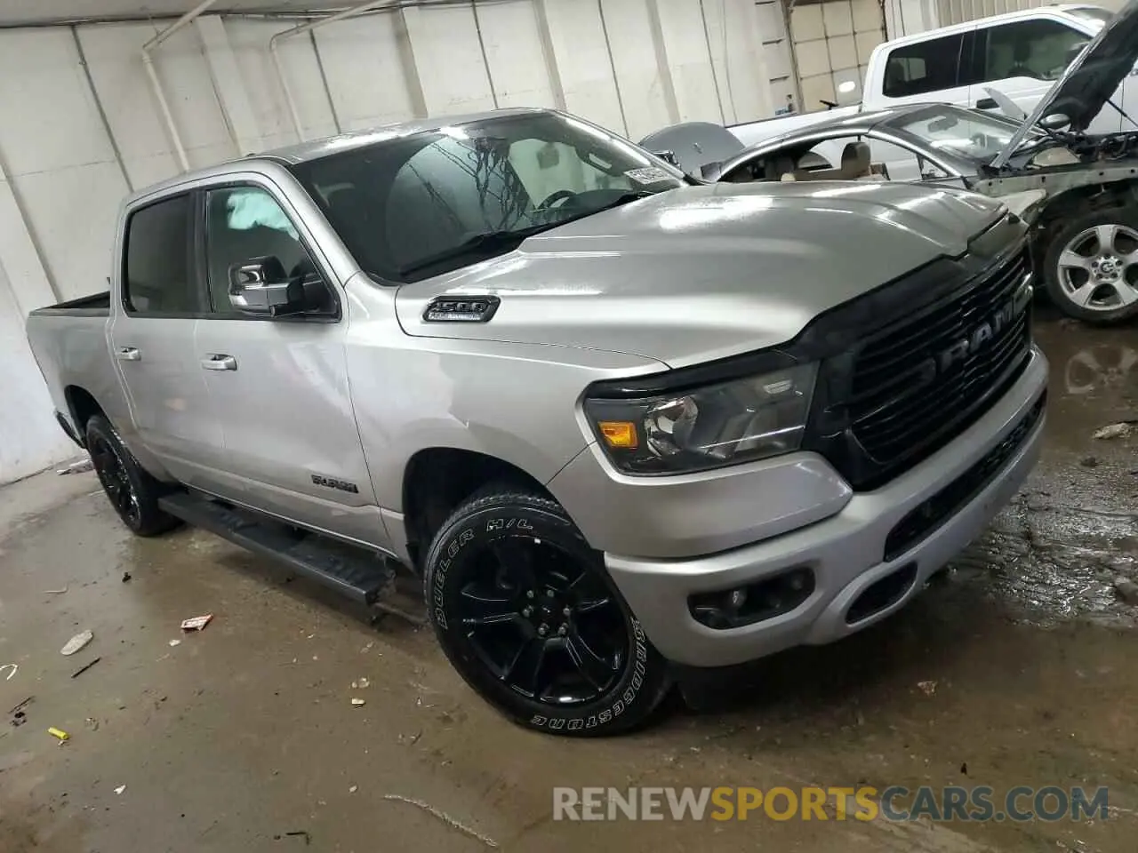 4 Photograph of a damaged car 1C6SRFFT2MN598580 RAM 1500 2021