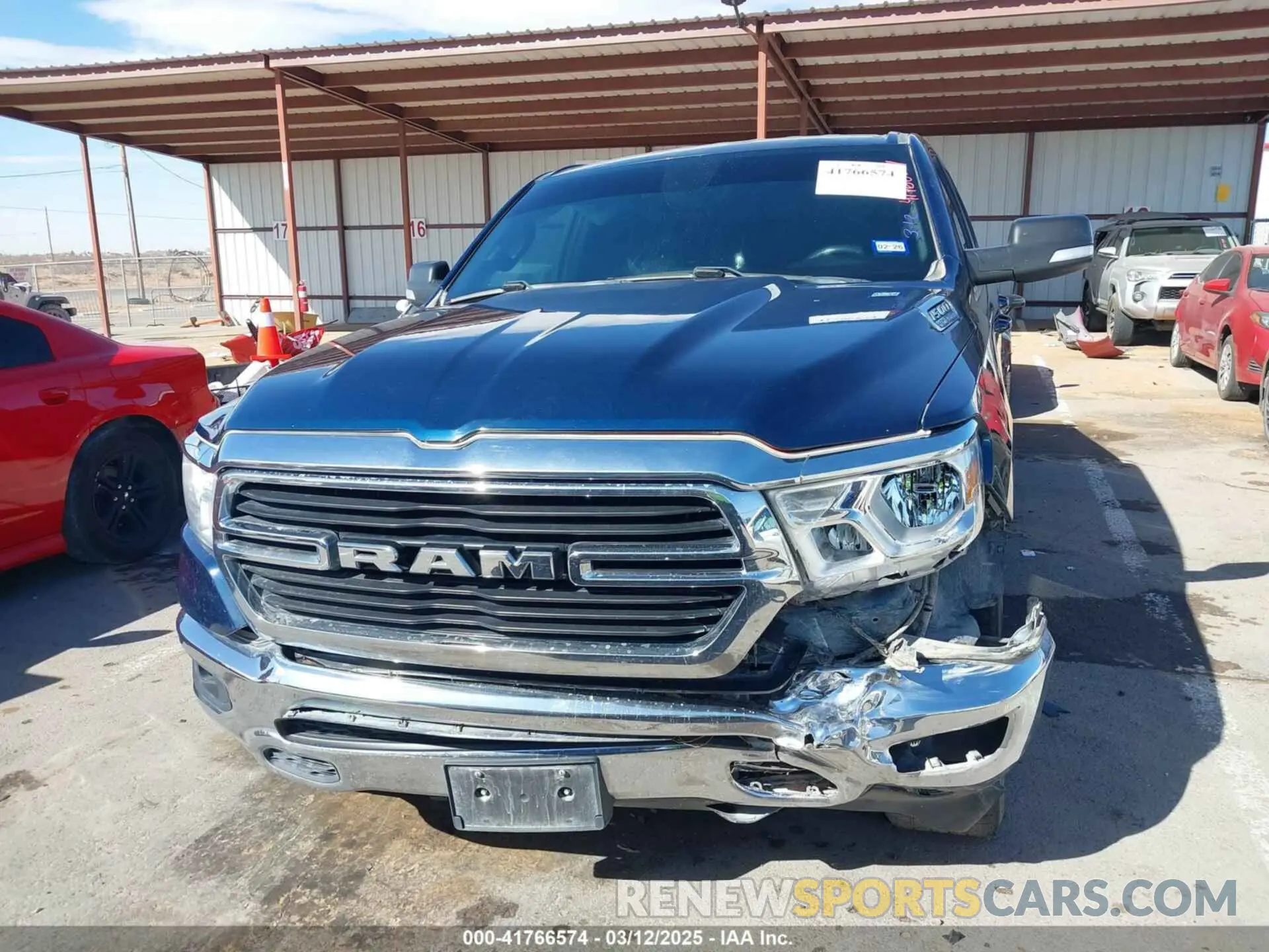 12 Photograph of a damaged car 1C6SRFFT2MN634705 RAM 1500 2021