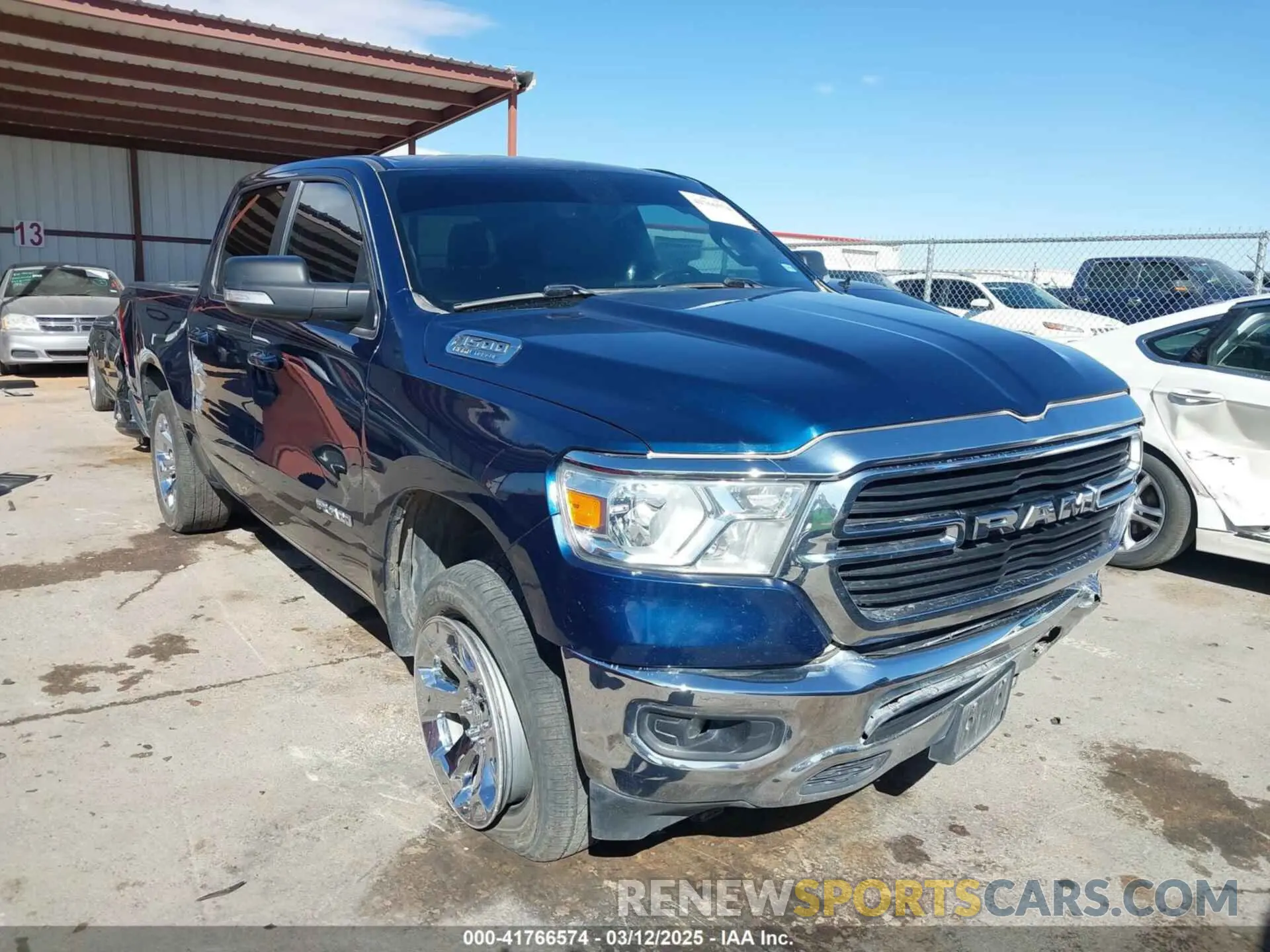 13 Photograph of a damaged car 1C6SRFFT2MN634705 RAM 1500 2021