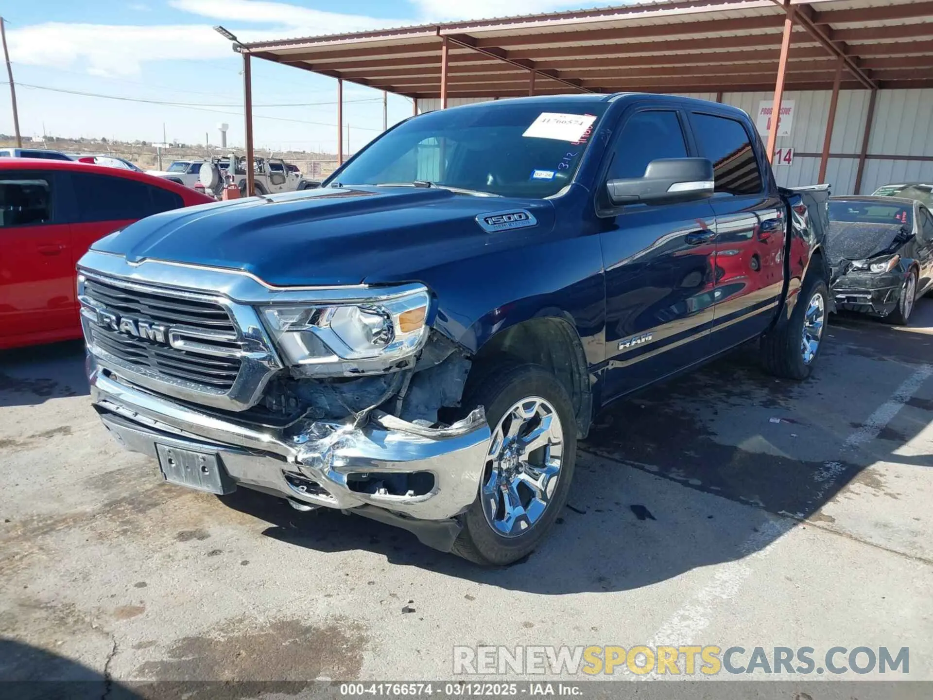 2 Photograph of a damaged car 1C6SRFFT2MN634705 RAM 1500 2021